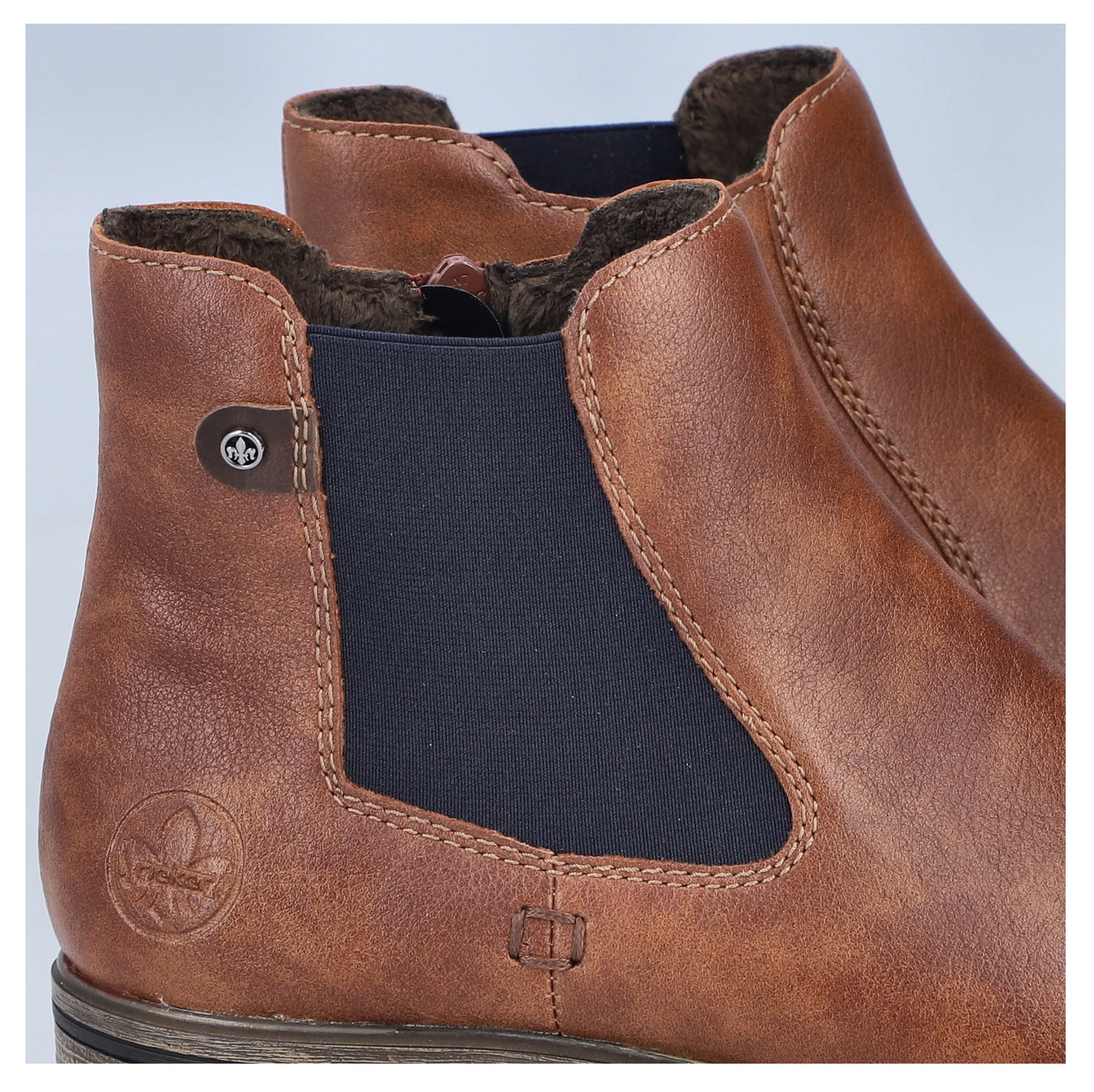 Rieker Chelseaboots  , Schlupfboots, Stiefelette, Blockabsatz, mit wärmendem Textilfutter