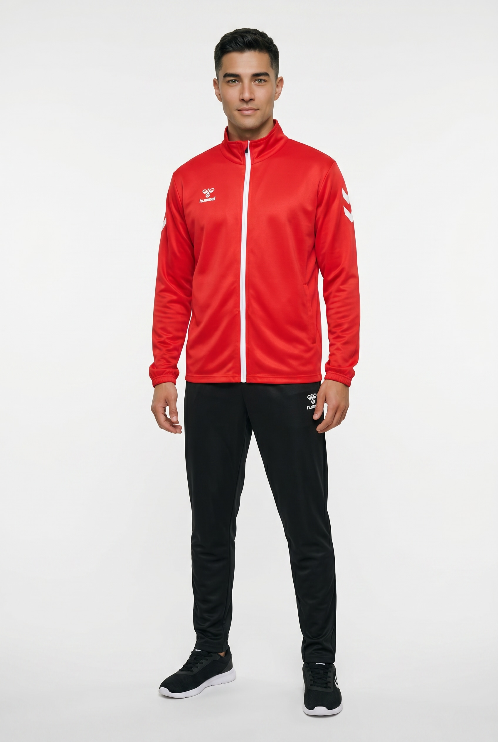 hummel Combinaison d'entraînement »HMLLOGO SUIT« 2 cuis ensemble deux pièces, sans capuche, en polyester
