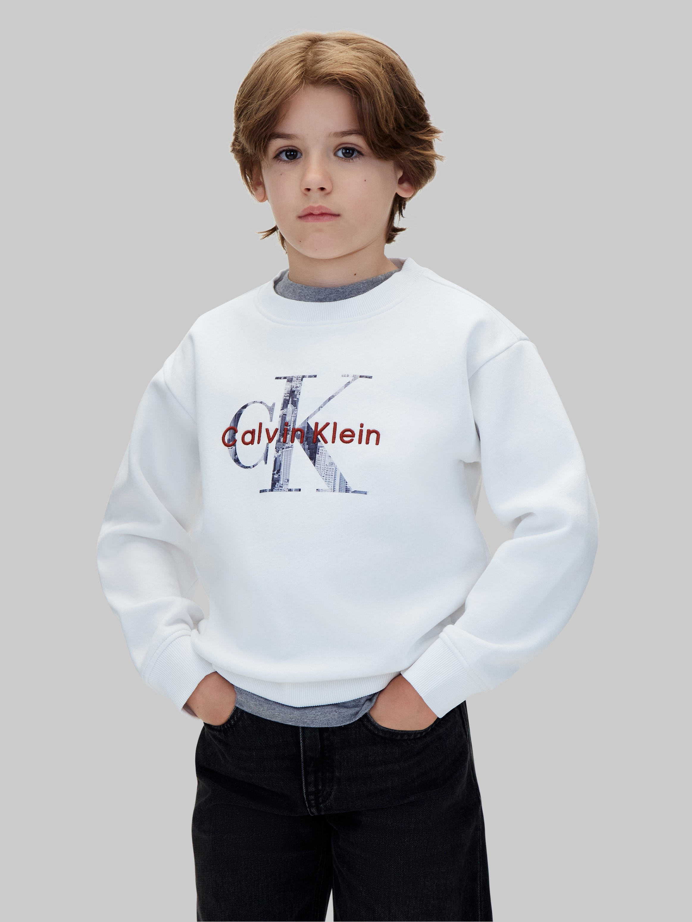 Calvin Klein Jeans Sweatshirt »FILLED MONOLOGO CN SWEATSHIRT«, Regular fit mit Rundhalsausschnitt, Logoschriftzug
