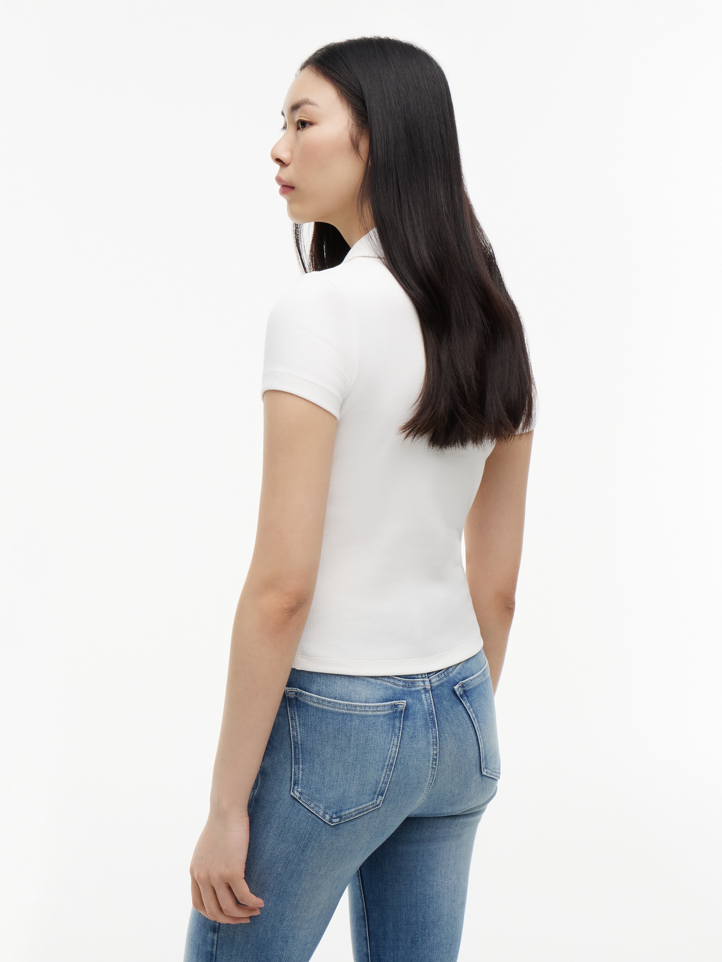 Tommy Jeans Polo »TJW SLIM RIB SCRIPT POLO« Mélange de coton, coupe slim, ajustée, en structure côtelée