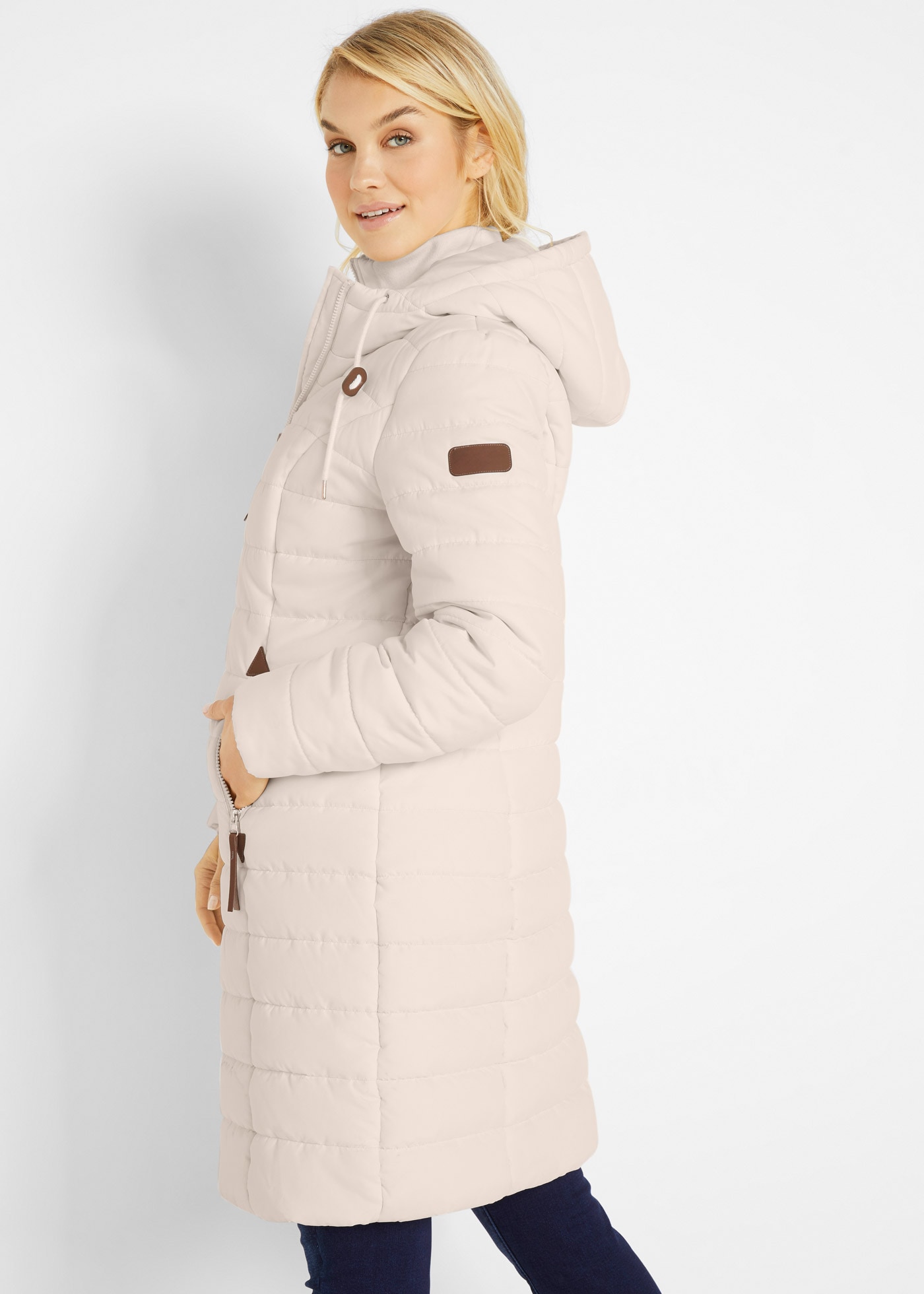 bonprix Steppmantel »Steppmantel, 2-in-1 Optik« mit Lederimitat Zeichen am Ärmel, mit Kapuze und Stehkragen