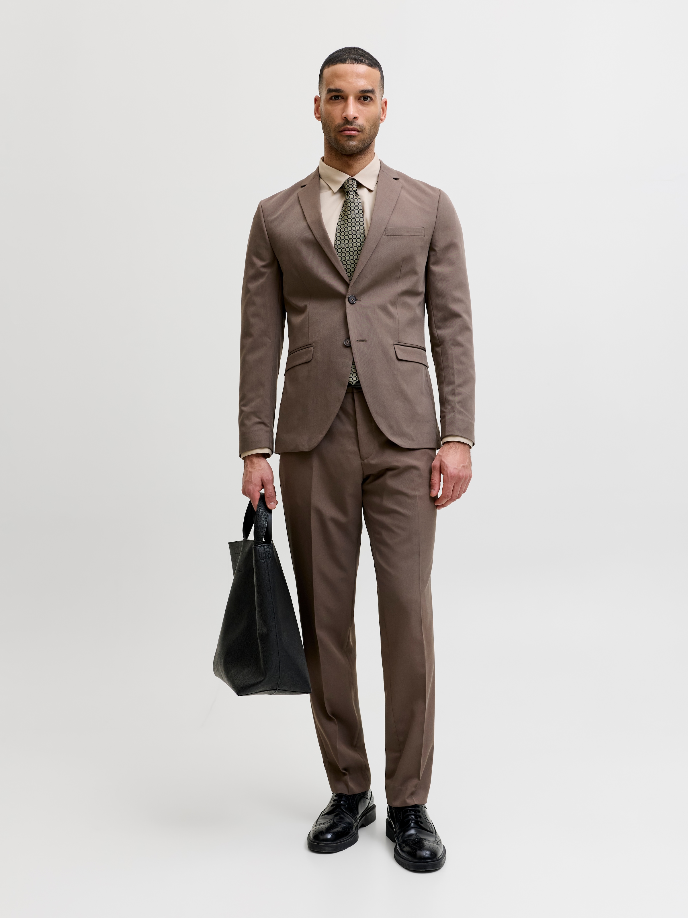 Jack & Jones Anzug »JPRFRANCO  Extra schmal, pflegeleicht, stilvoll mit fallendem Revers« slim fit Materialmix aus Polyester, Viskose und Elasthan
