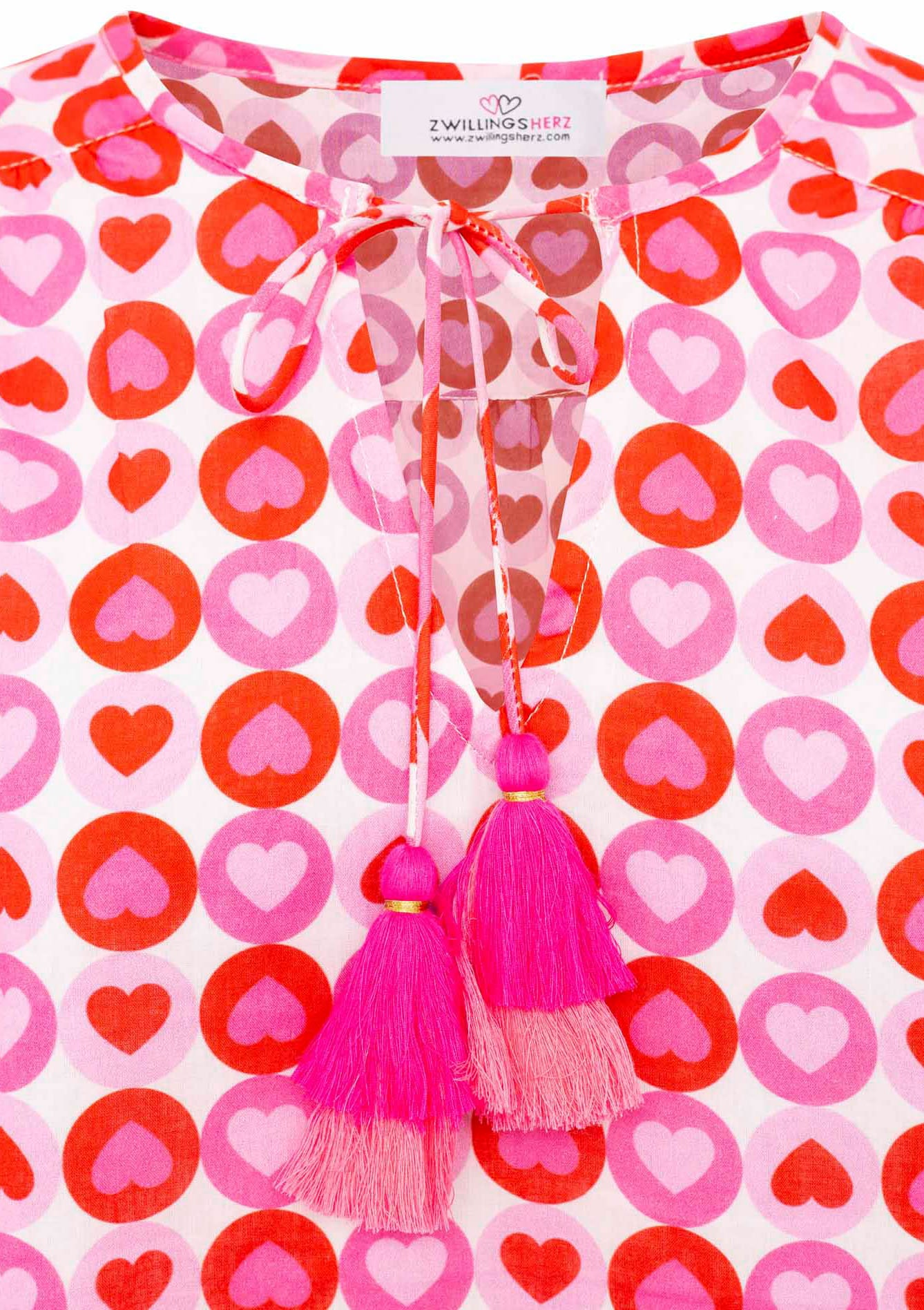 Zwillingsherz Shirtbluse »"Schmetterling"«, Blumenmuster, Tasseln ,Pom Pom Besatz, Langarm
