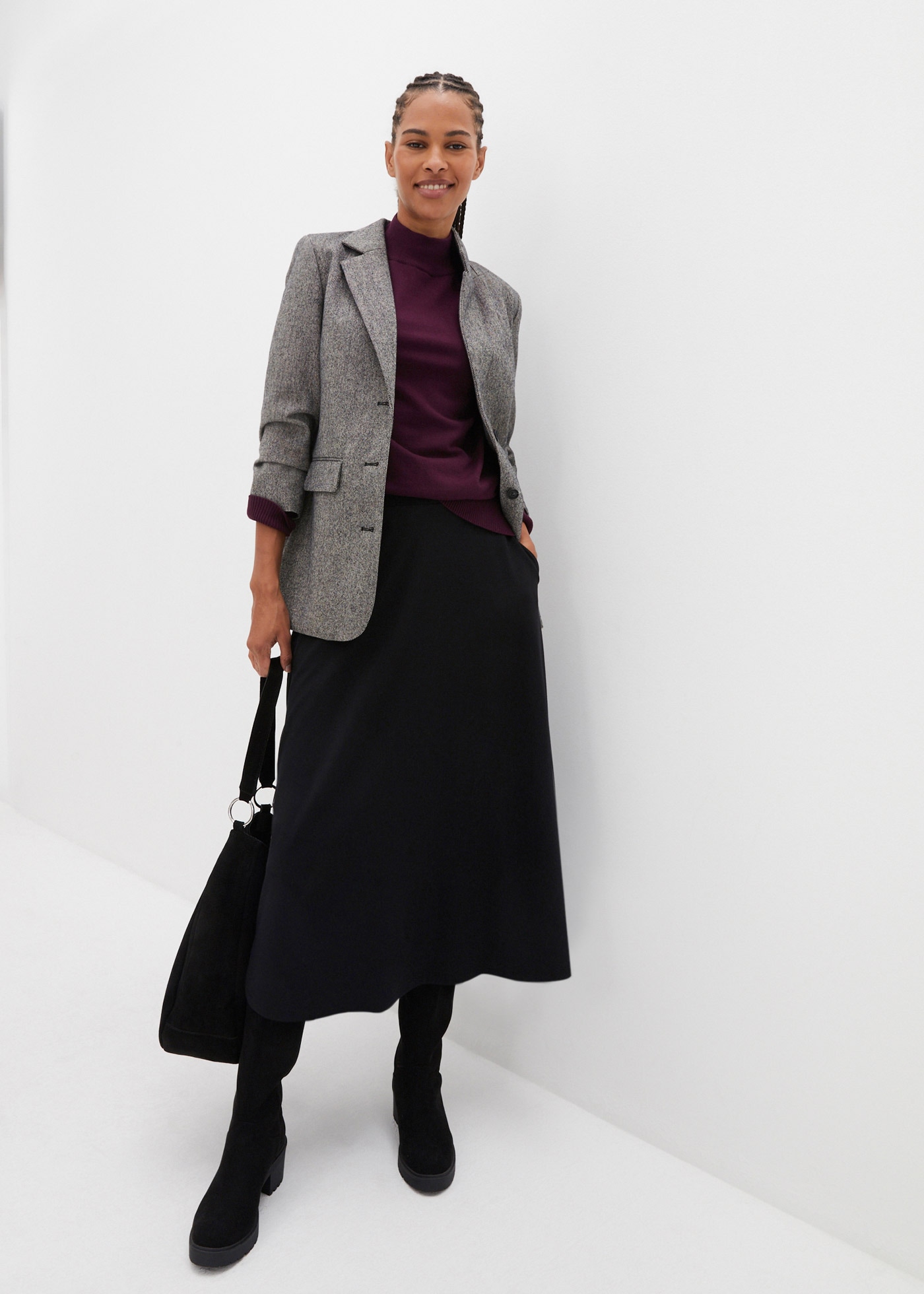 bonprix Jupe midi en mélange de matériaux doux, coupe évasée