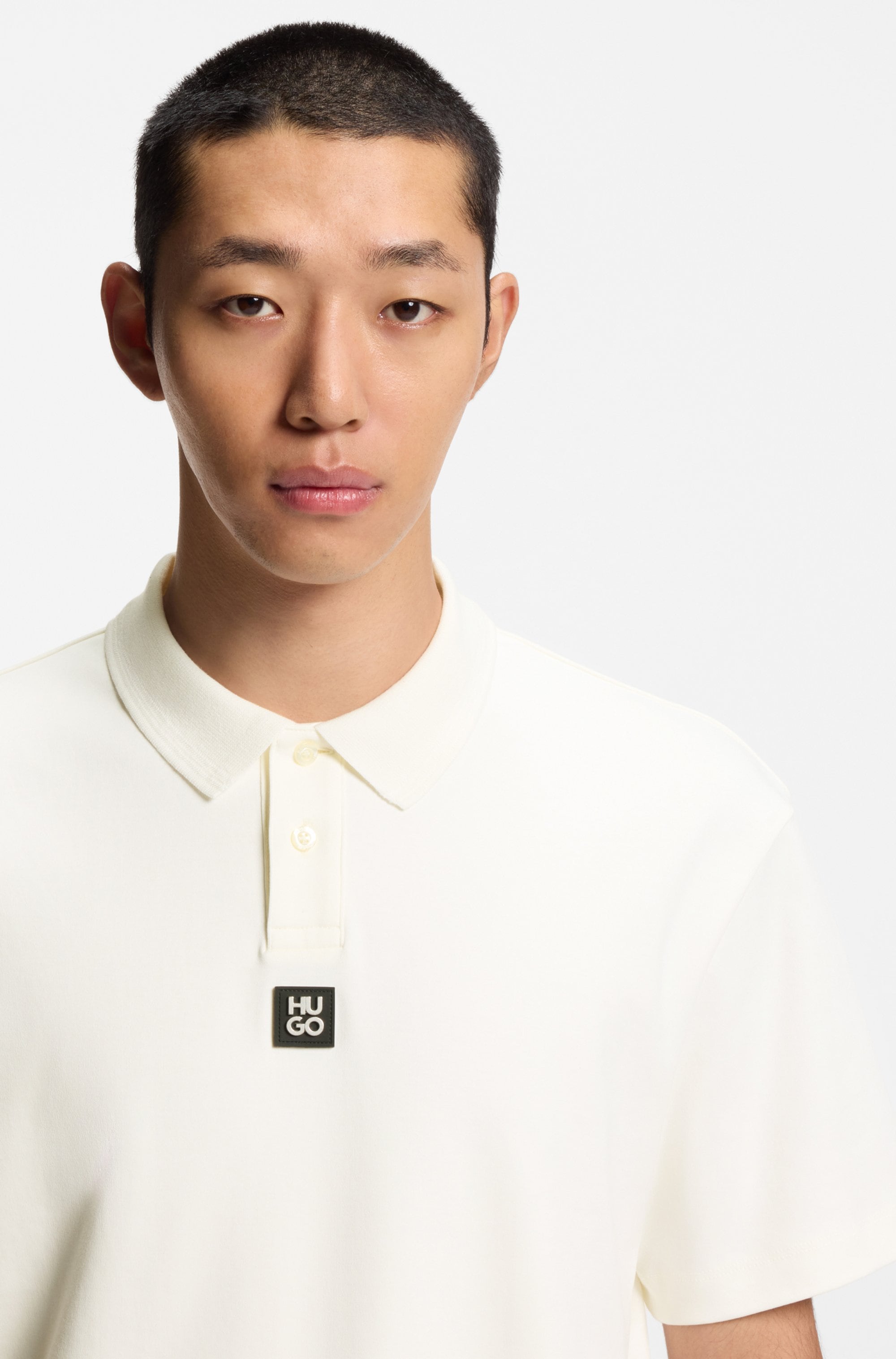 HUGO Polo »Deabono_D Metal Logo« col polo, coton pur, coupe regular fit