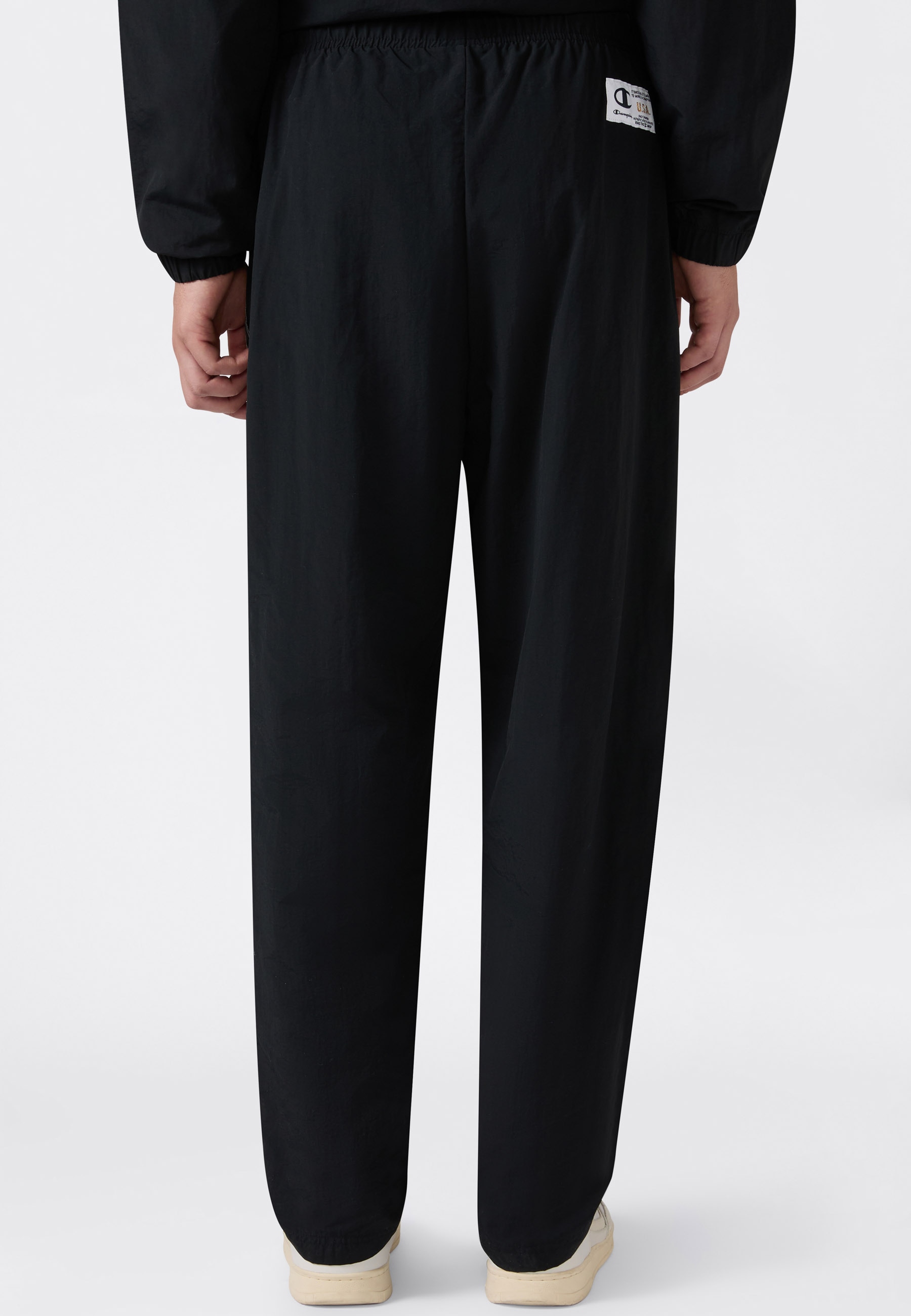 Champion Pantalon de survêtement »SPORTWEAR OPEN HEM PANTS Loose Fit Nylon«  mit sportlicher Optik, aus Polyamid