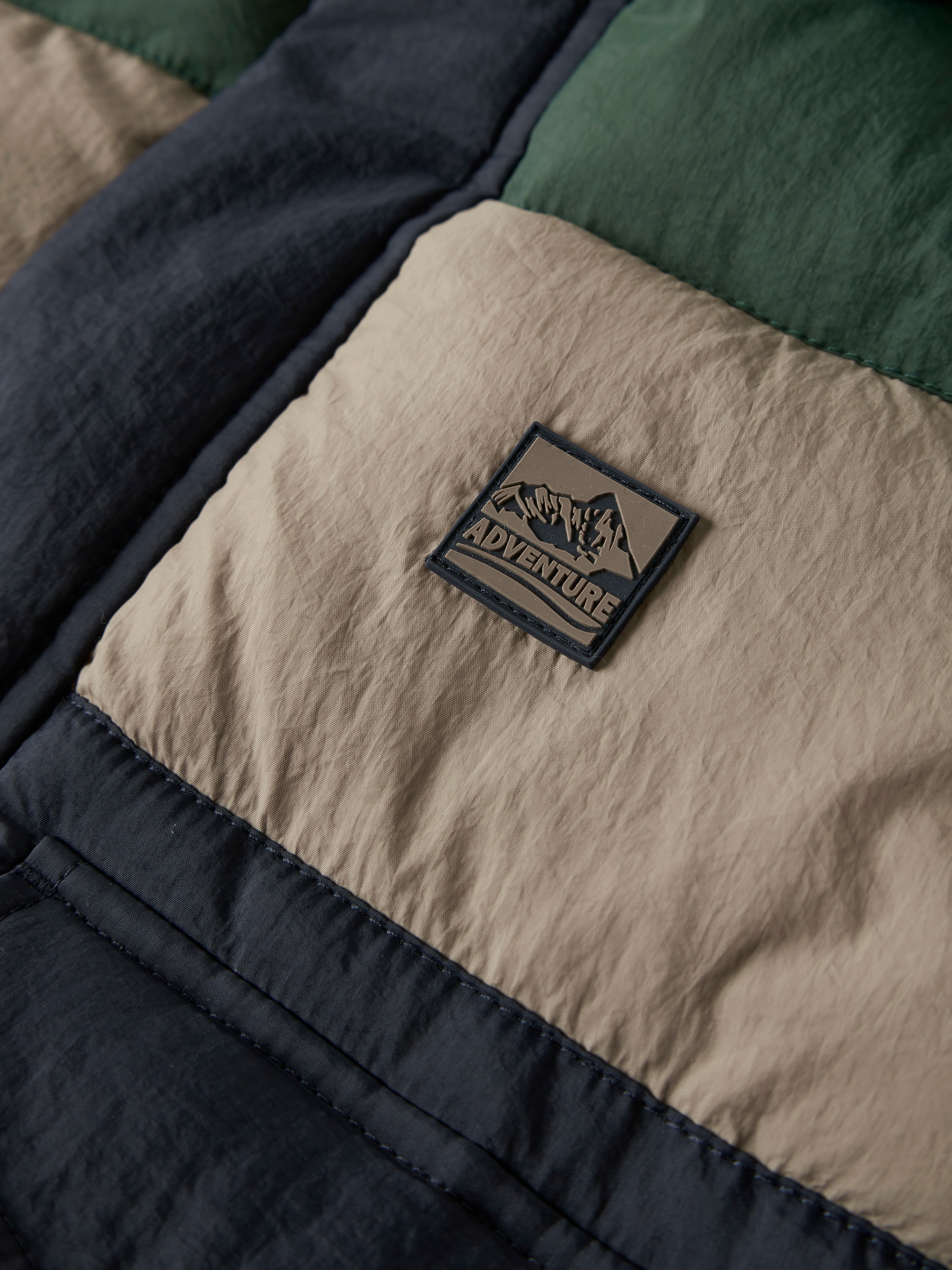Name It Veste matelassée »NMMMELBOURNE PUFFER JACKET BLOCK« avec capuche