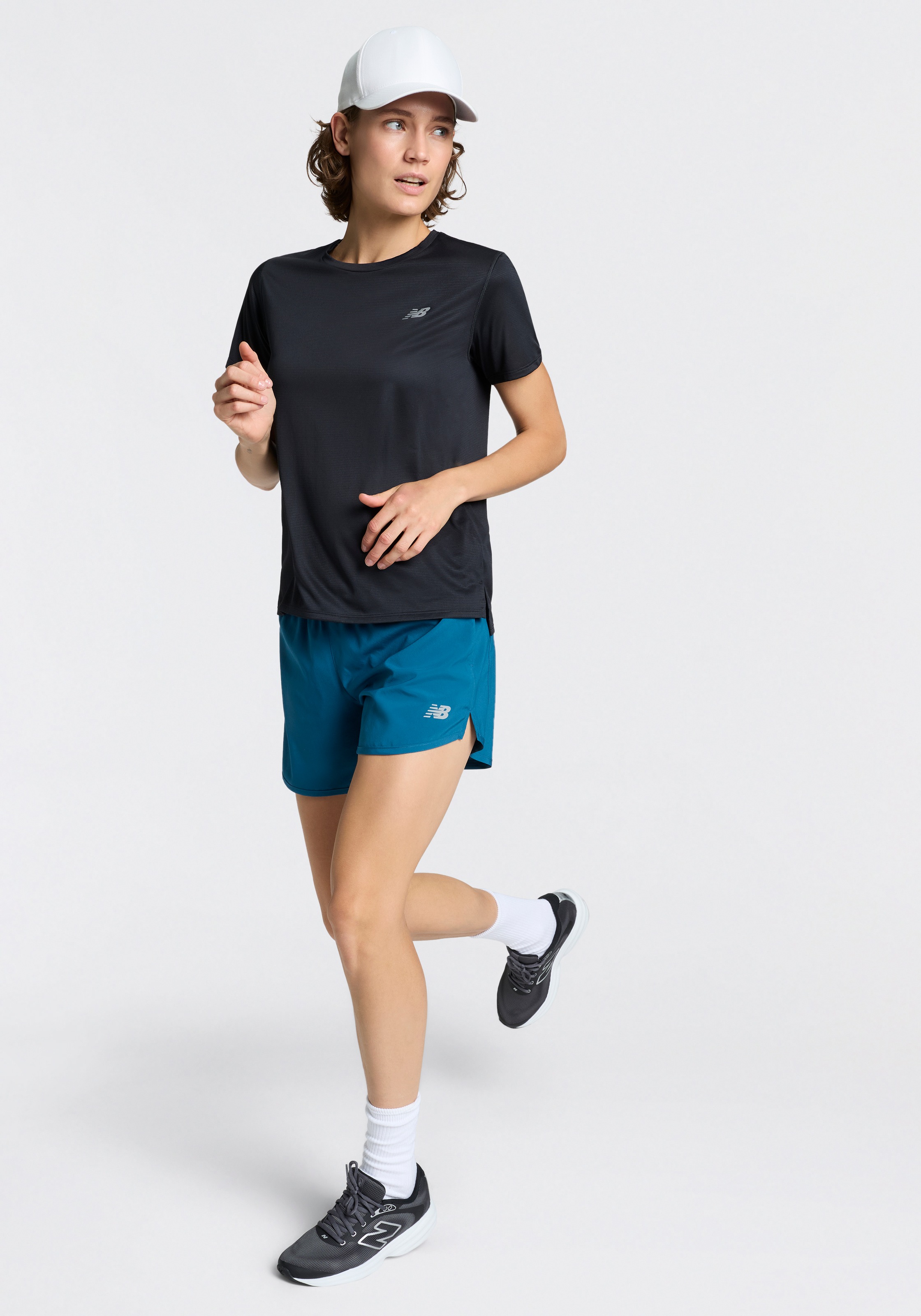 New Balance Short de course »SPORT ESSENTIAL SHORT 5«  avec poches latérales, en matière stretch, respirant