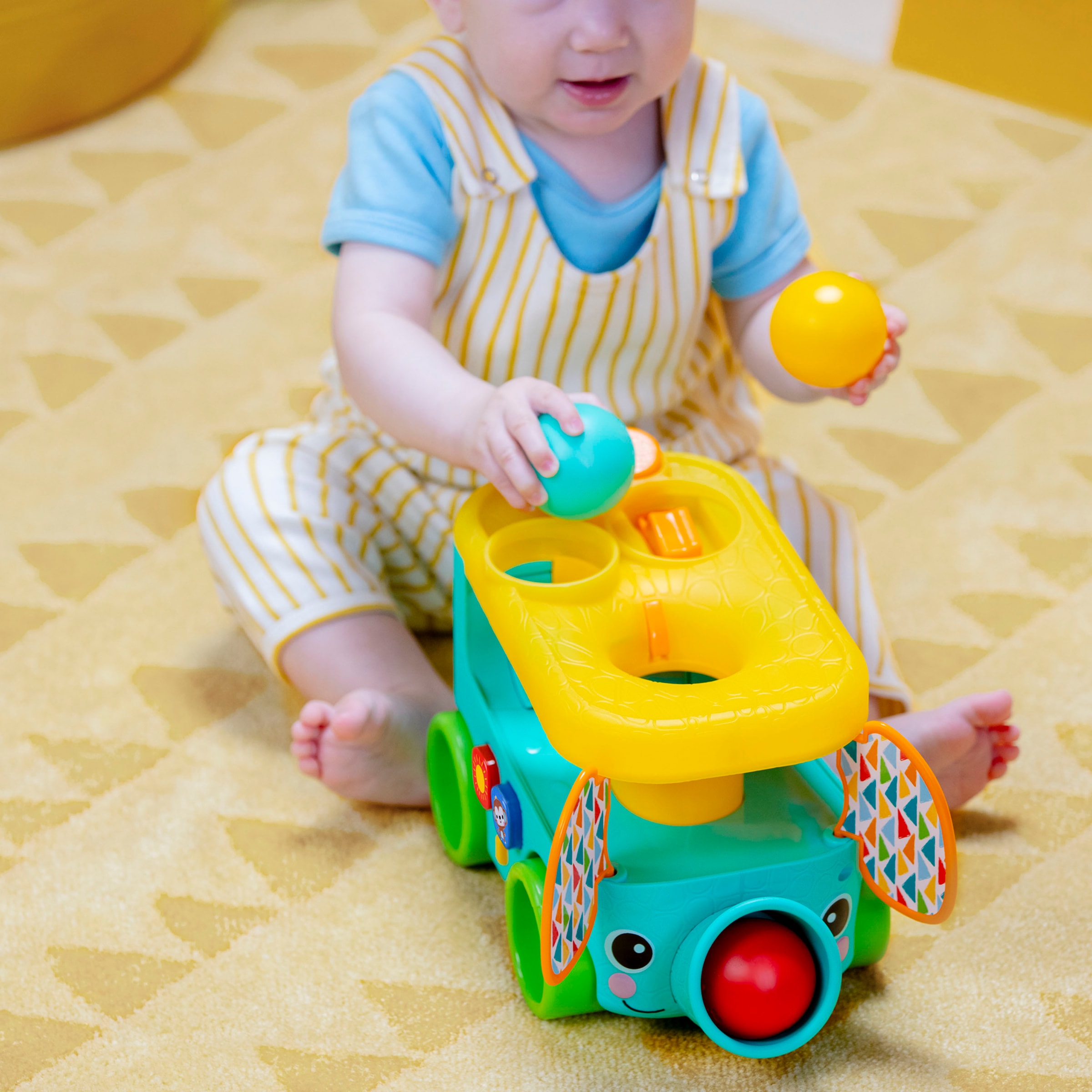 Bright Starts Lernspielzeug »Pop & Roll Safari Bus  Ball Play Toy« mit Licht und Sound