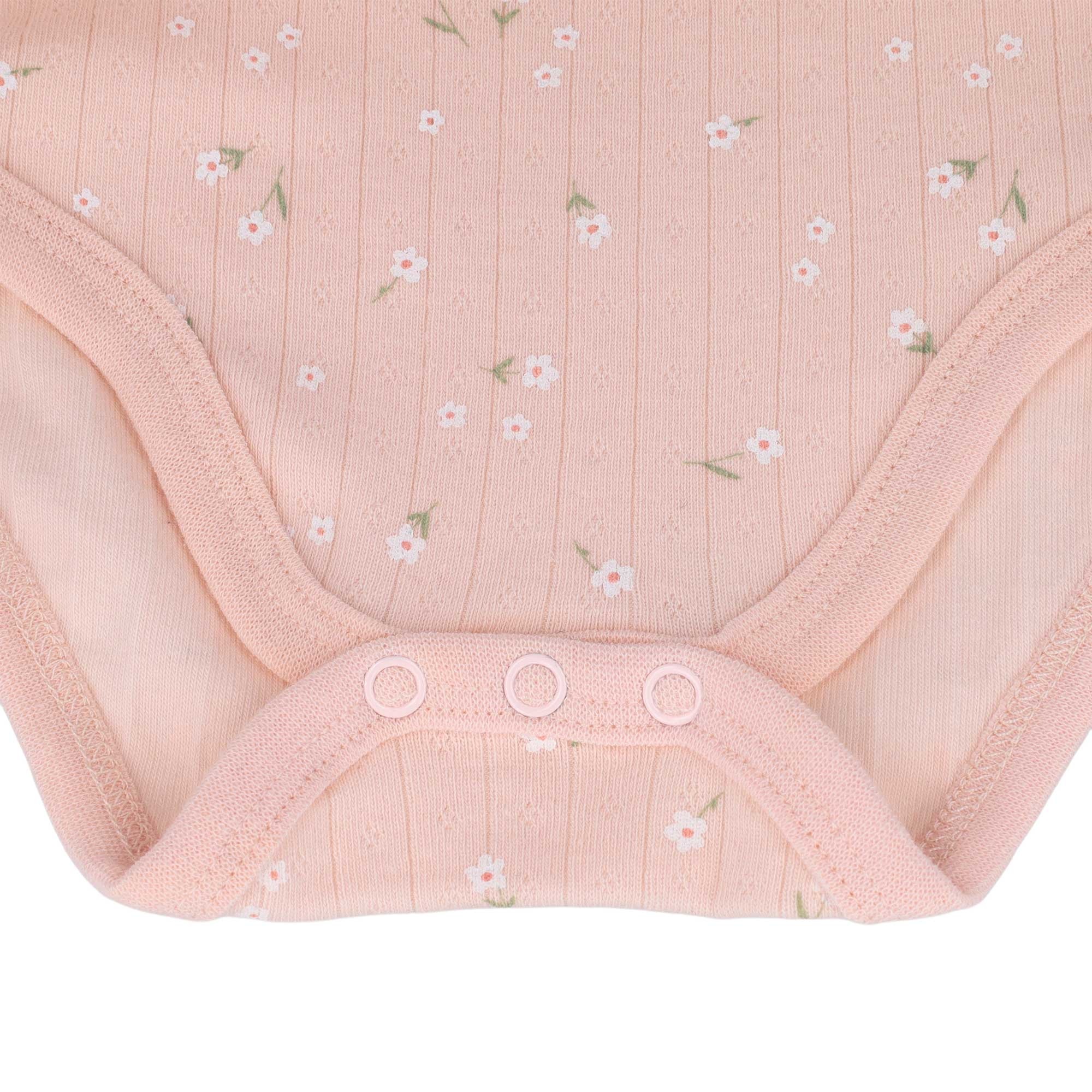 MAXIMO Body à manches courtes 1 rose pâle, imprimé floral intégral, manches courtes, bébé fille