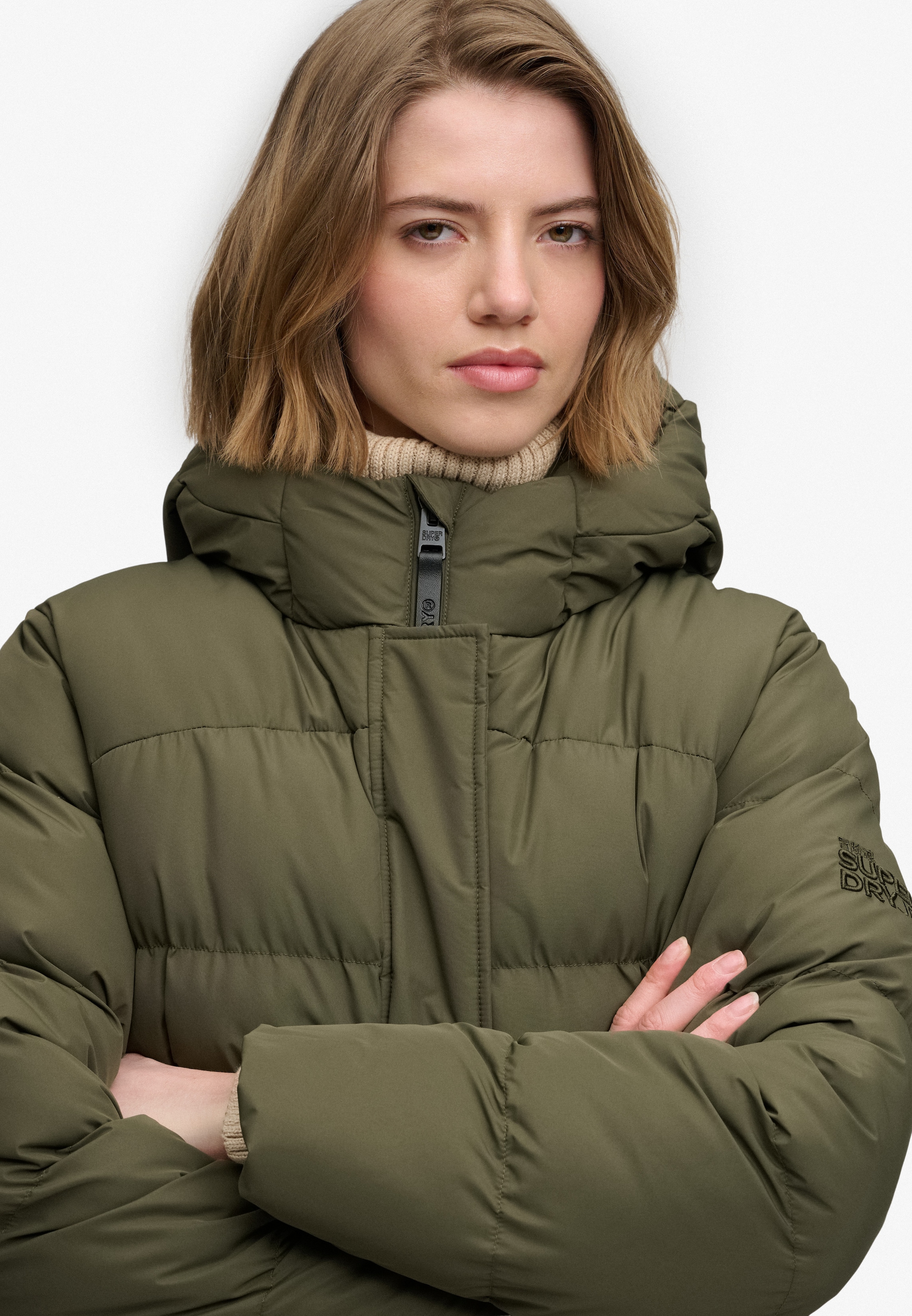Superdry Veste matelassée »HOODED SPORTS PUFFER MID JKT« fibre synthétique, coupe décontractée