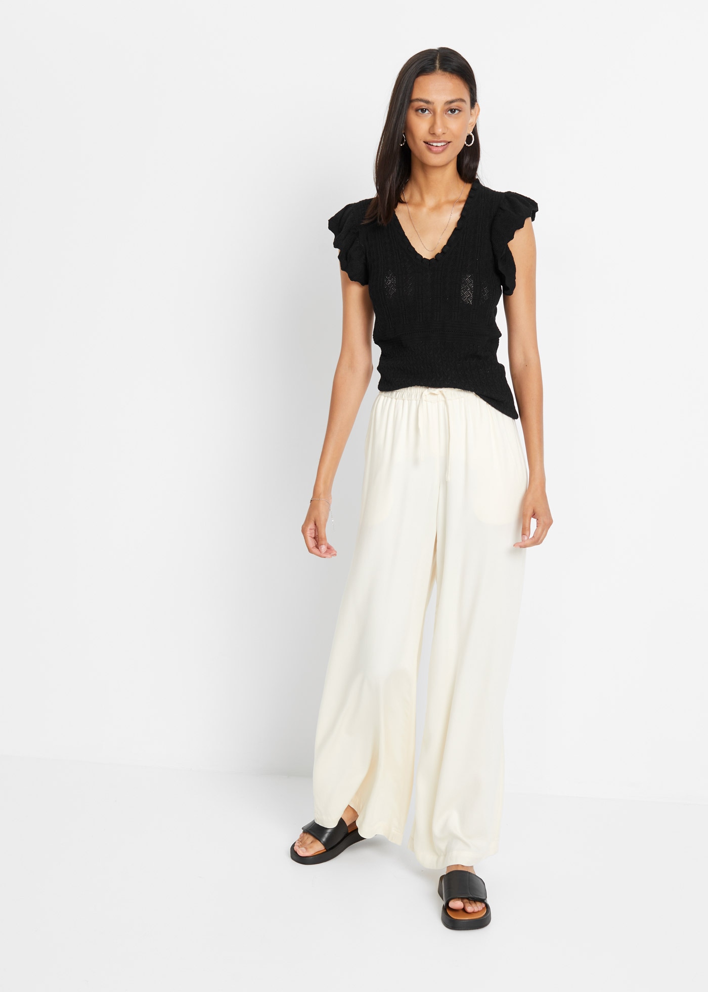 bonprix Pull en tricot Ajour-Strick mit hohem Viskoseanteil, ärmellos mit Volant