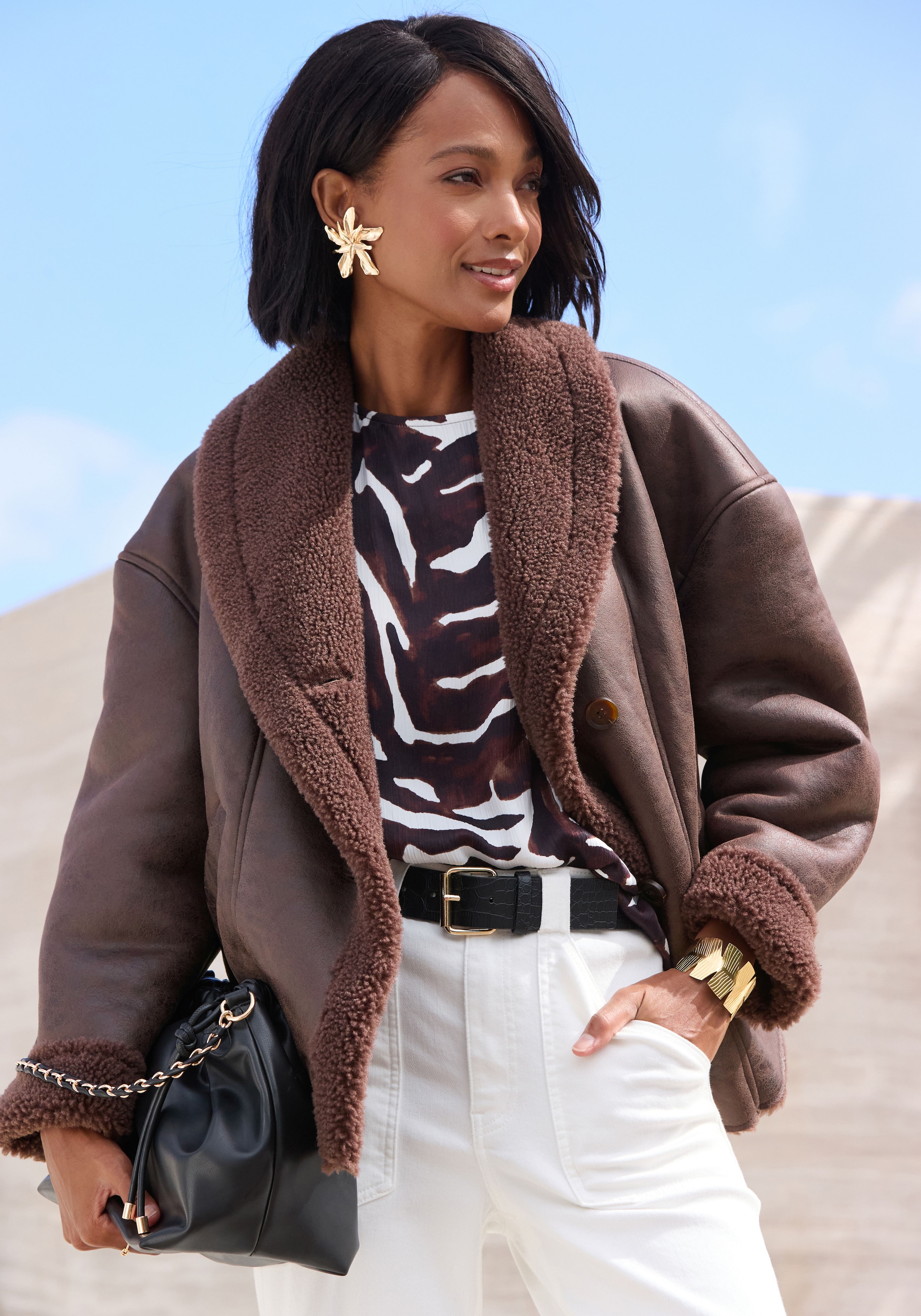 LASCANA Veste en imitation cuir »mit weichem Teddyfutter und Knopfleiste« Kuschelige Übergangsjacke, Herbstjacke aus Kunstleder, Lammkunstfell