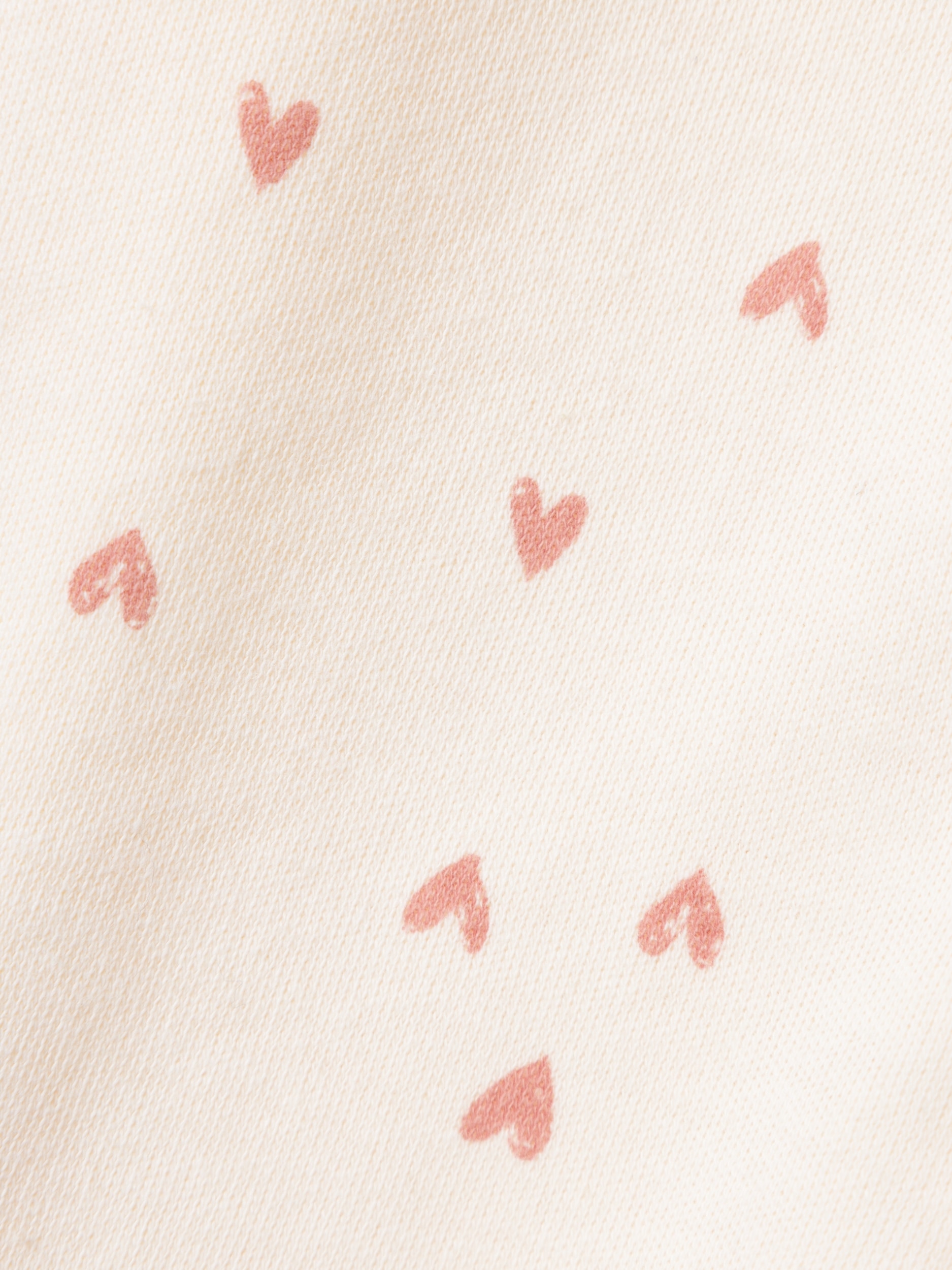 Name It Schlafanzug »NBFNIGHTSUIT ZIP BUTTERCREAM HEARTS NOOS« aus Baumwolle in Jersey-Qualität, Relaxed Fit, mit Reissverschluss