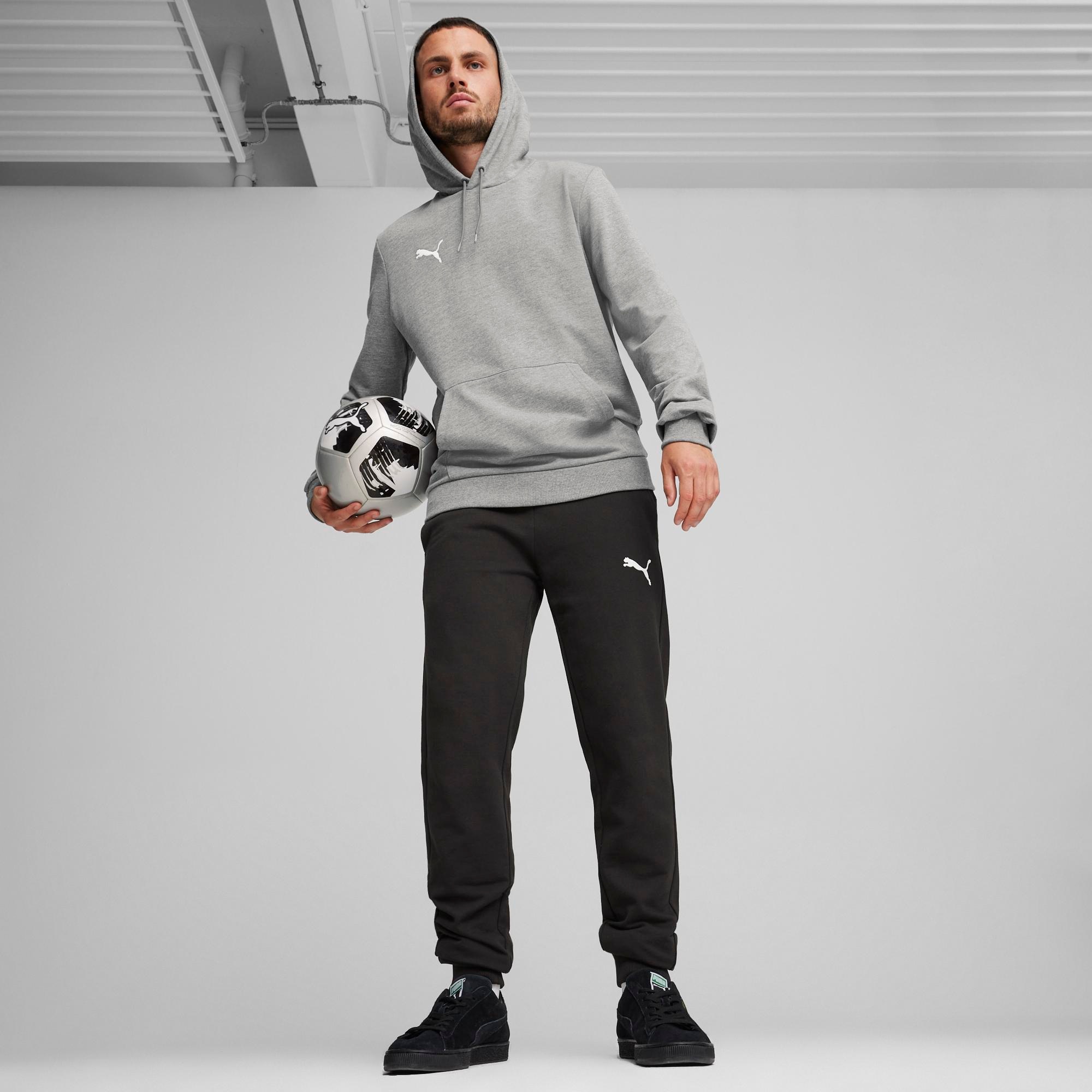 PUMA Pantalon de survêtement »TEAMGOAL CASUALS PANTS«  coupe slim fit, pour football et activités sportives