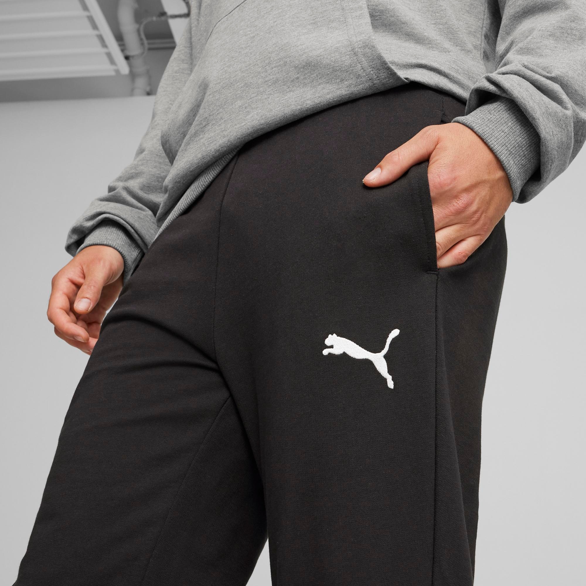 PUMA Pantalon de survêtement »TEAMGOAL CASUALS PANTS«  coupe slim fit, pour football et activités sportives