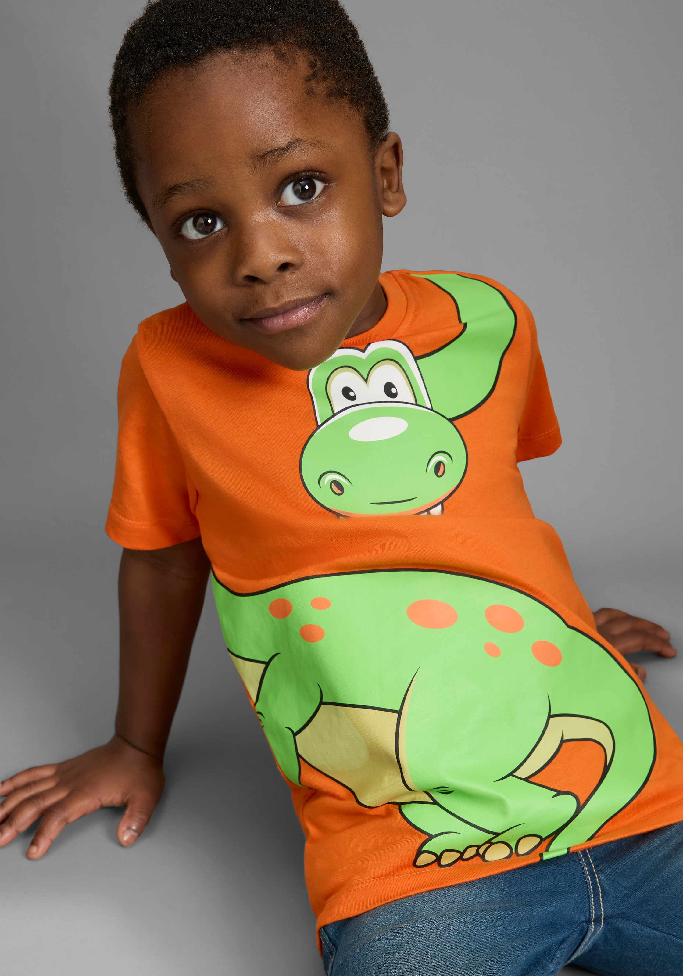 KIDSWORLD T-shirt »Mit grossem Druck: GREEN DINO« Kurzarm,  Basic-Passform,  bedruckt,  Rundhalsausschnitt