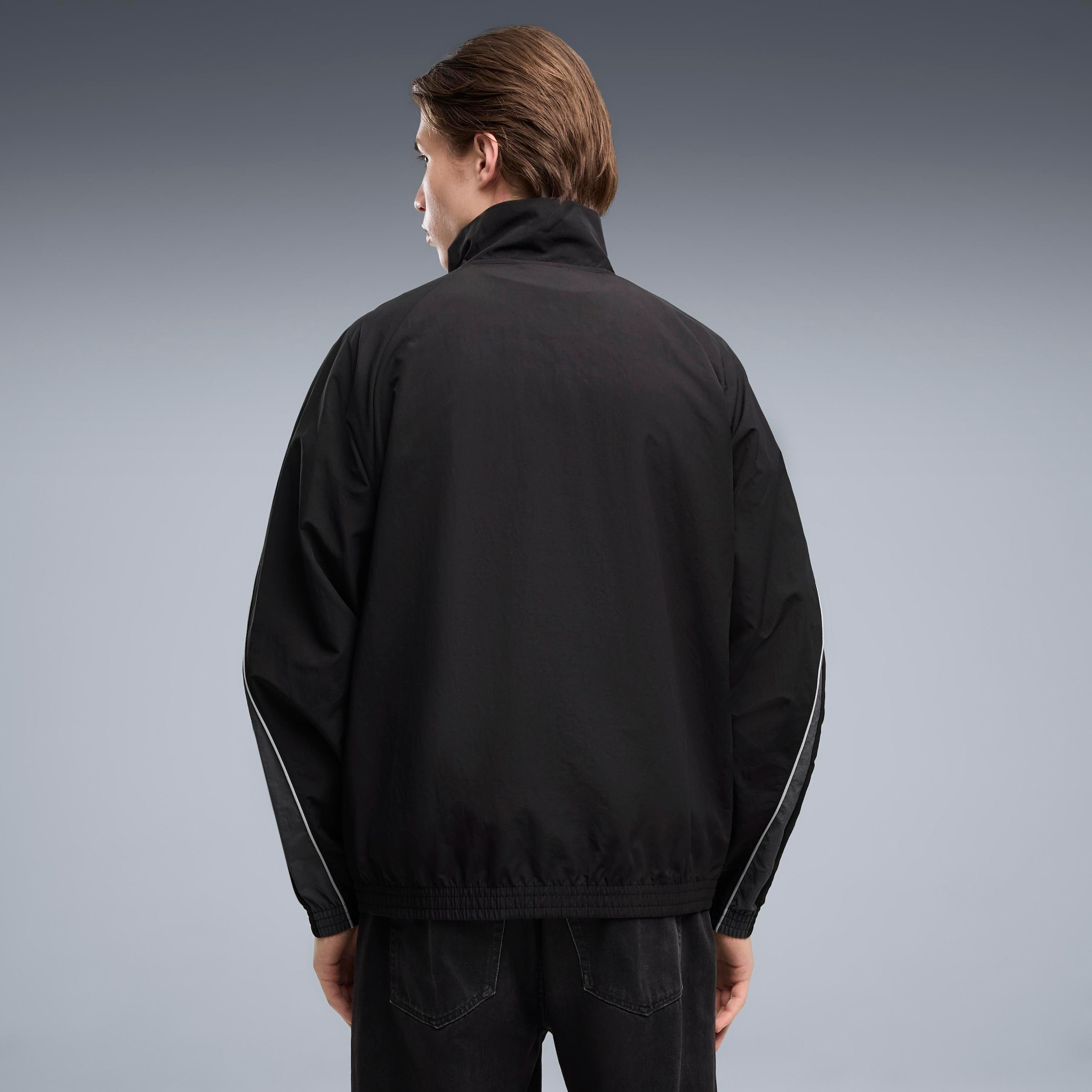 PUMA Trainingsjacke »SPORT RELAXED WOVEN TRACK JACKET« ohne Kapuze mit Stehkragen, bedruckte Optik, Relaxed Fit, normale Länge