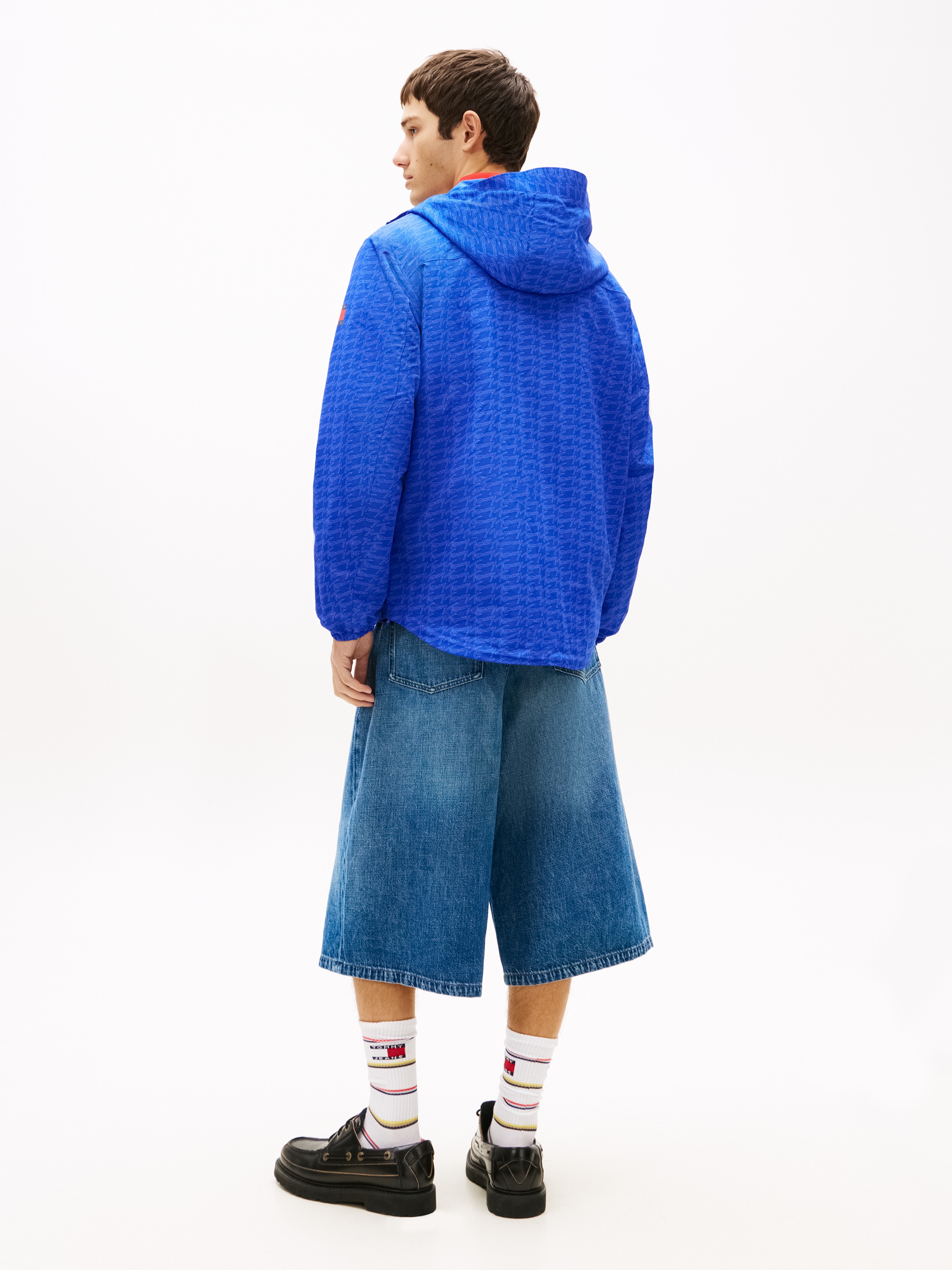 Tommy Jeans Coupe-vent »TJM AOP PACKABLE« avec capuche déperlant, coupe-vent, pliable