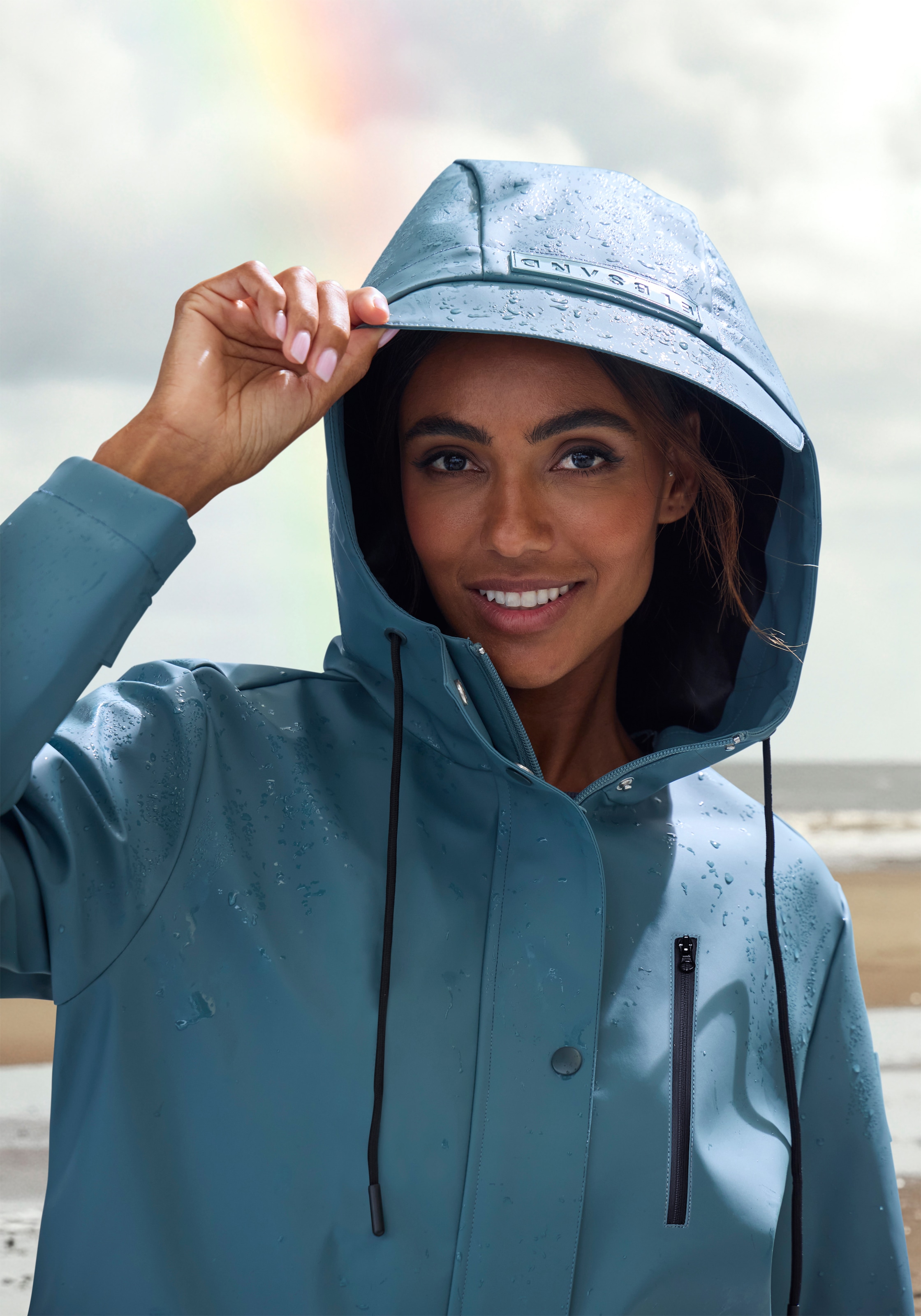 Elbsand Veste de pluie mit Kapuze Mesh-Einsatz unter der Rückenpasse für ausreichende Belüftung