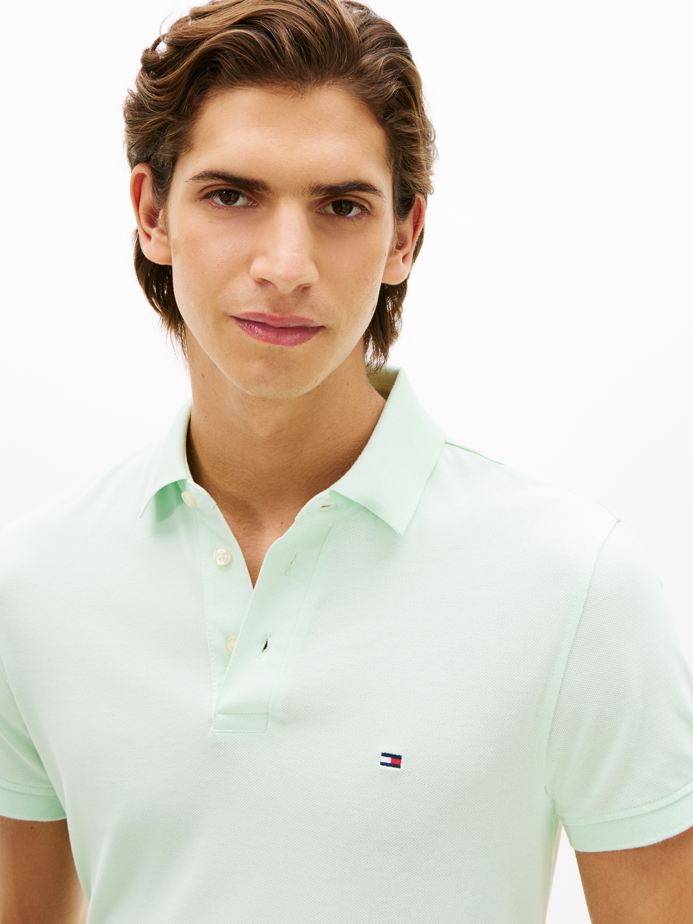 Tommy Hilfiger Polo »1985 SLIM POLO« avec broderie, qualité piqué, coupe slim