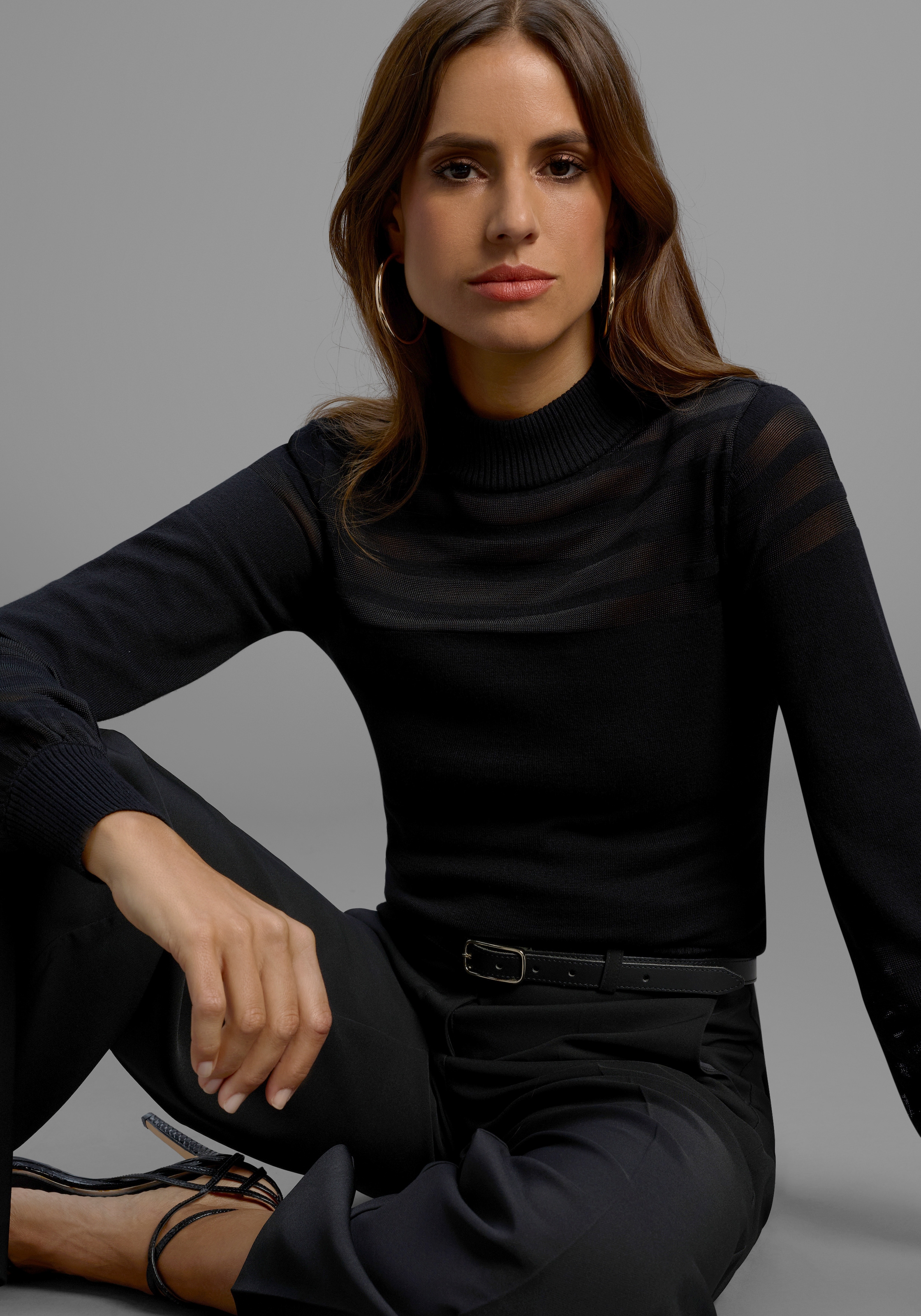 Melrose Pull à col montant mit transparenten Streifen und Ballonärmeln