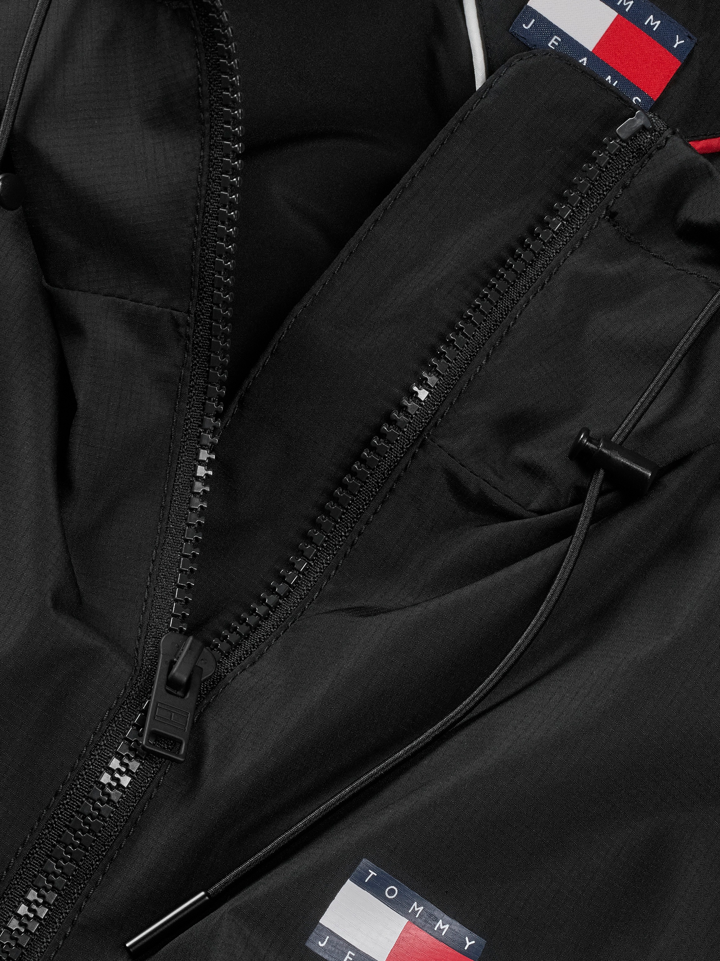 Tommy Jeans Windbreaker »TJW ESSENTIAL WINDBREAKER EXT« mit Kapuze mit Logodruck