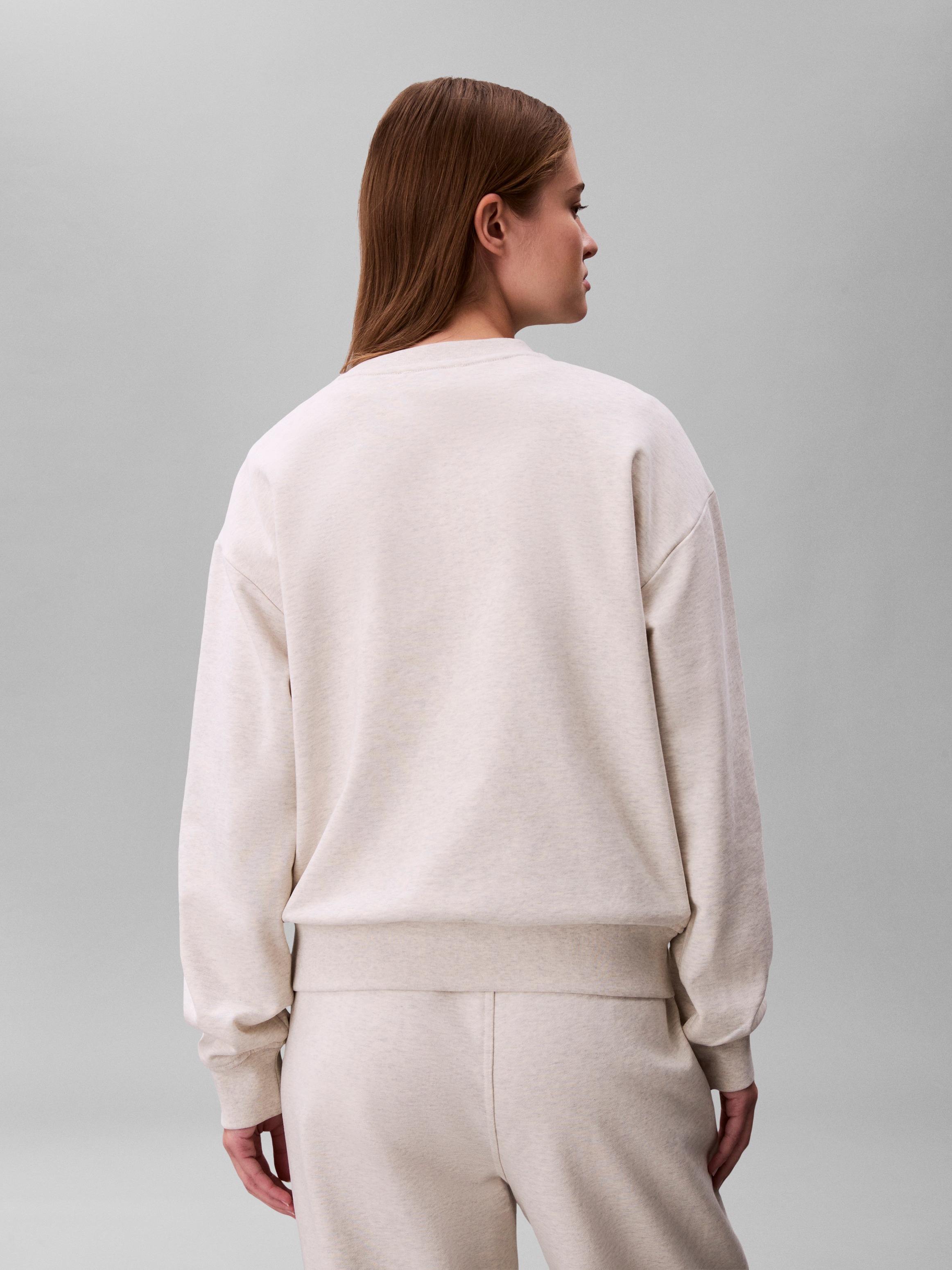 Calvin Klein Pull »EMBOSSED MONOLOGO«, Coupe régulière avec col rond
