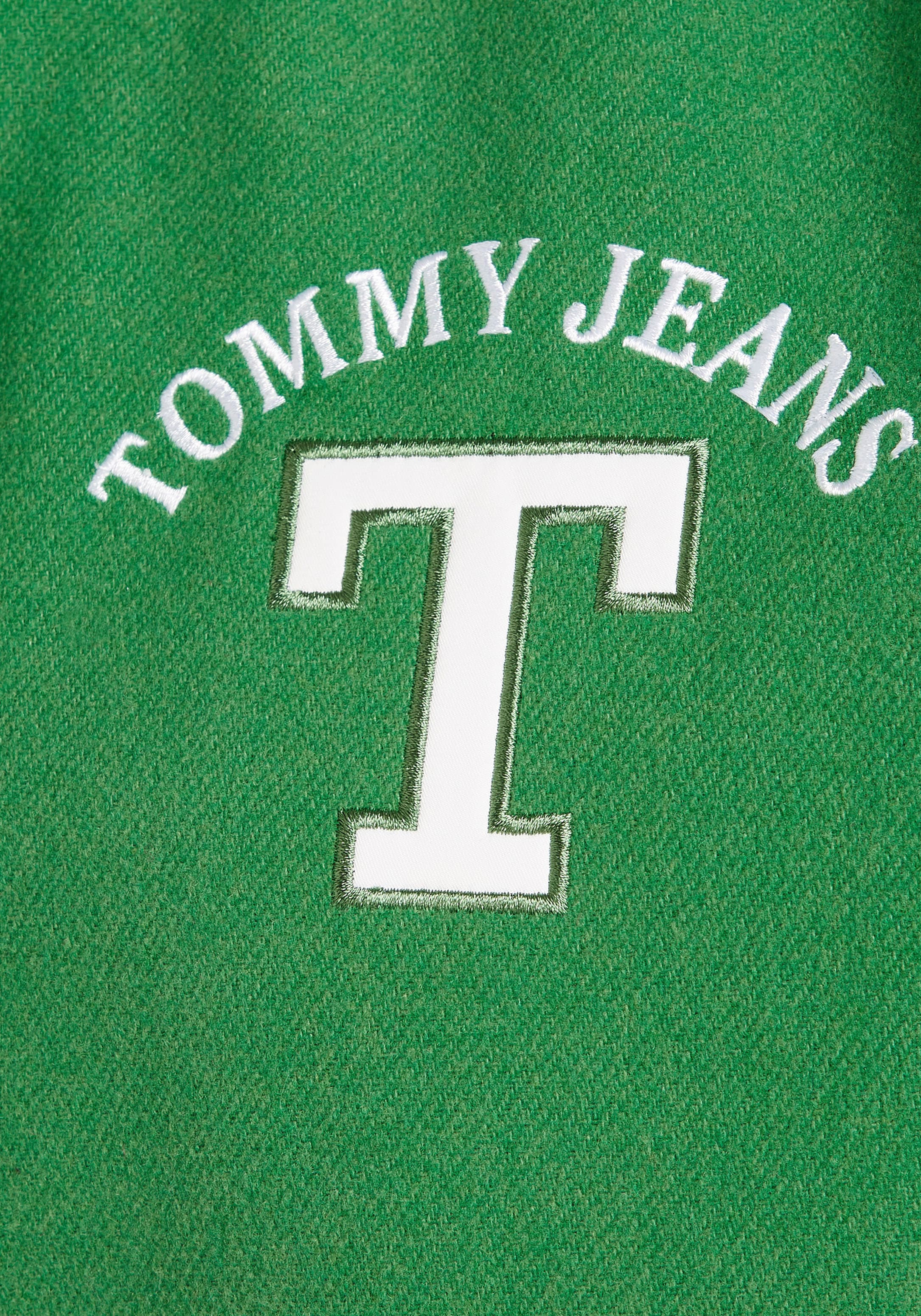 Tommy Jeans Steppweste »TJW ZIP OFF SLEEVE LETTERMAN«, Mit Jackenaufhänger am Krageninneren
