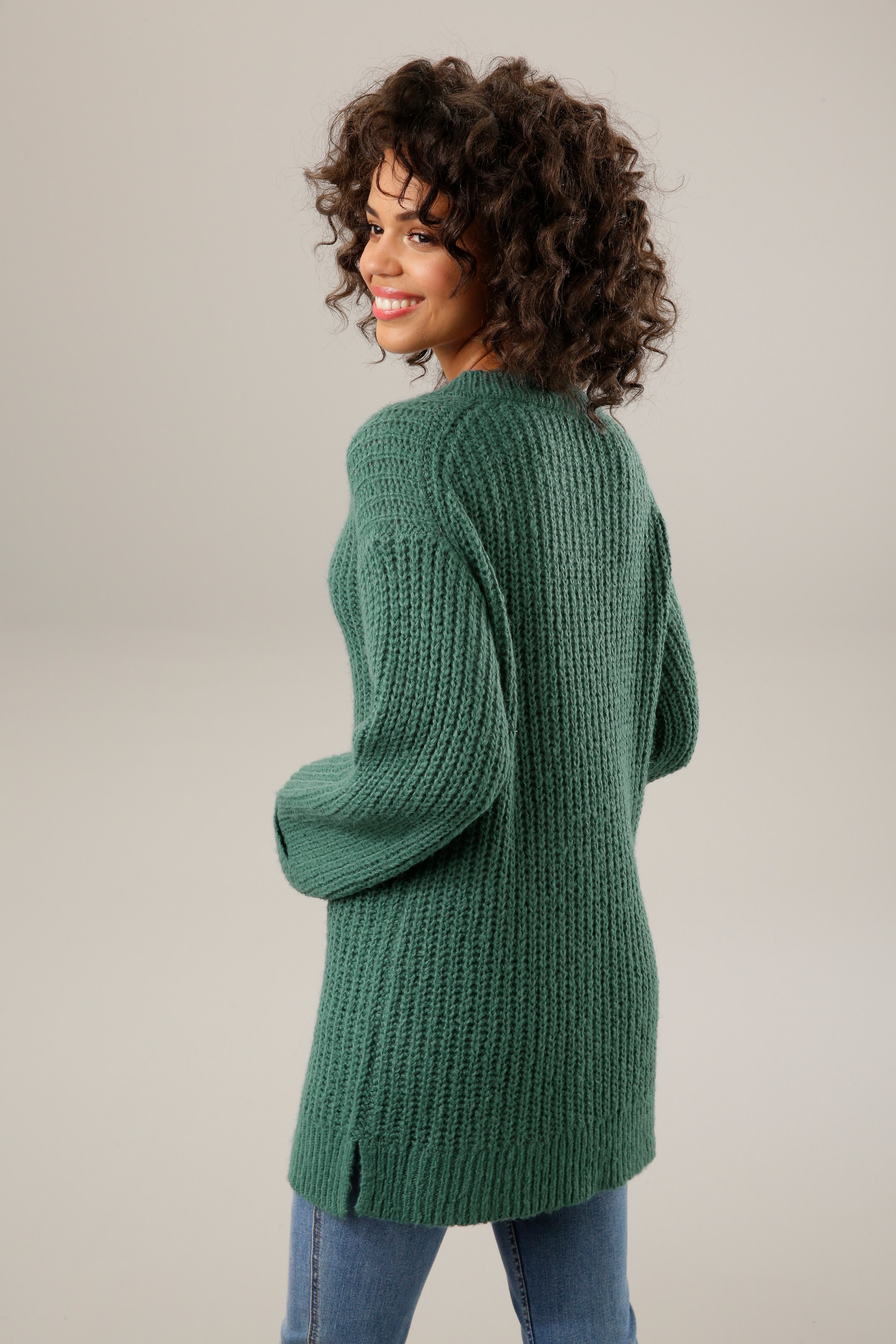 Aniston CASUAL Longpullover, mit fixierten Umschlag an den langen Ärmeln