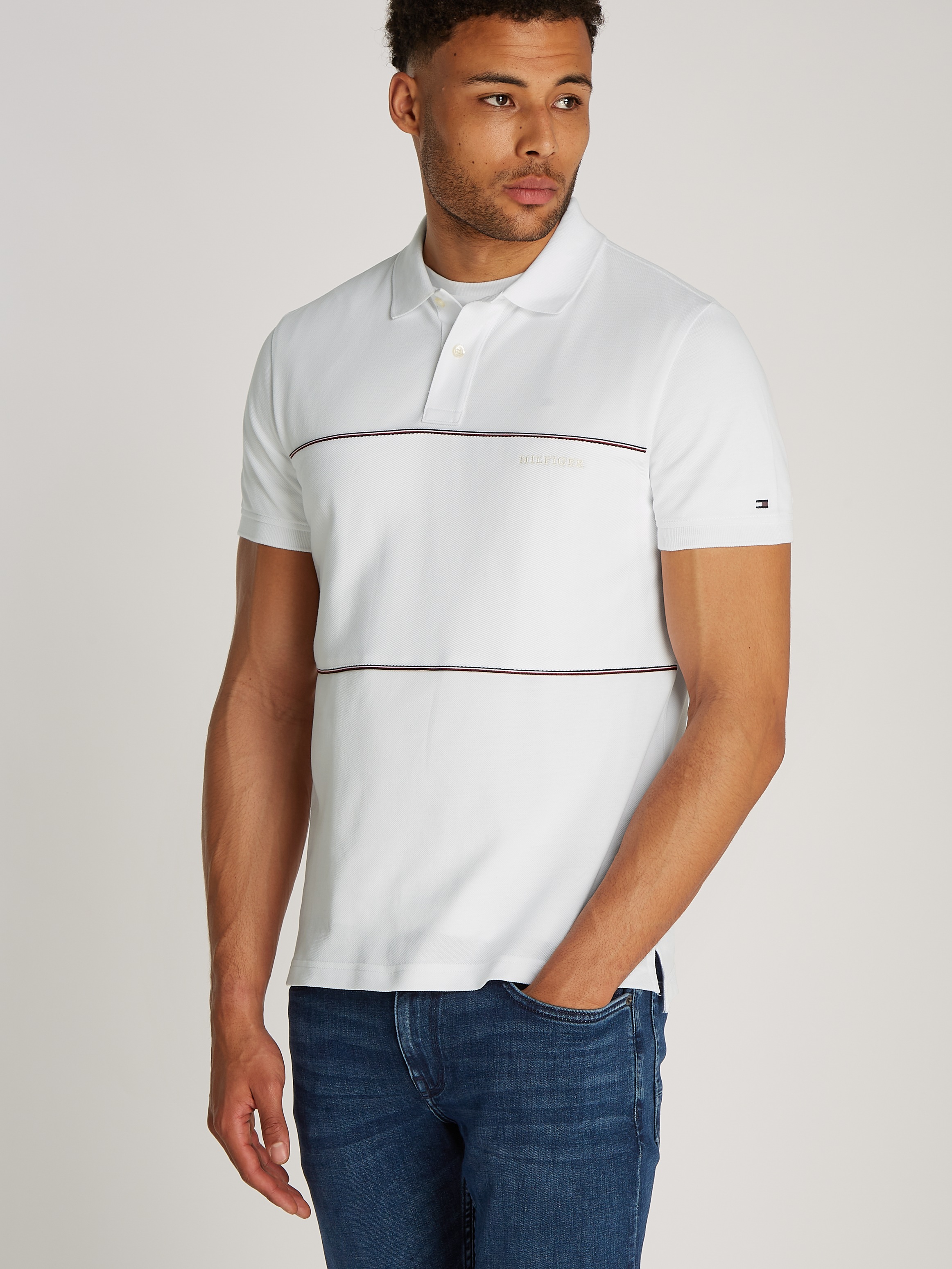 Tommy Hilfiger Poloshirt »GLOBAL STRIPE BLOCKING REG POLO« mit Logo-Stickerei und Logo-Streifen