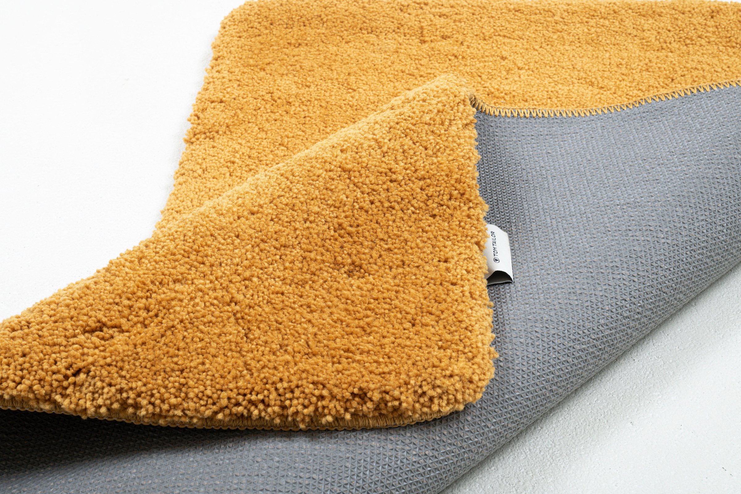 TOM TAILOR Badematte »Cozy Bath UNI«, rutschhemmend beschichtet, fussbodenheizungsgeeignet, Badteppich, Uni Farben, rechteckig, rund und oval erhältlich