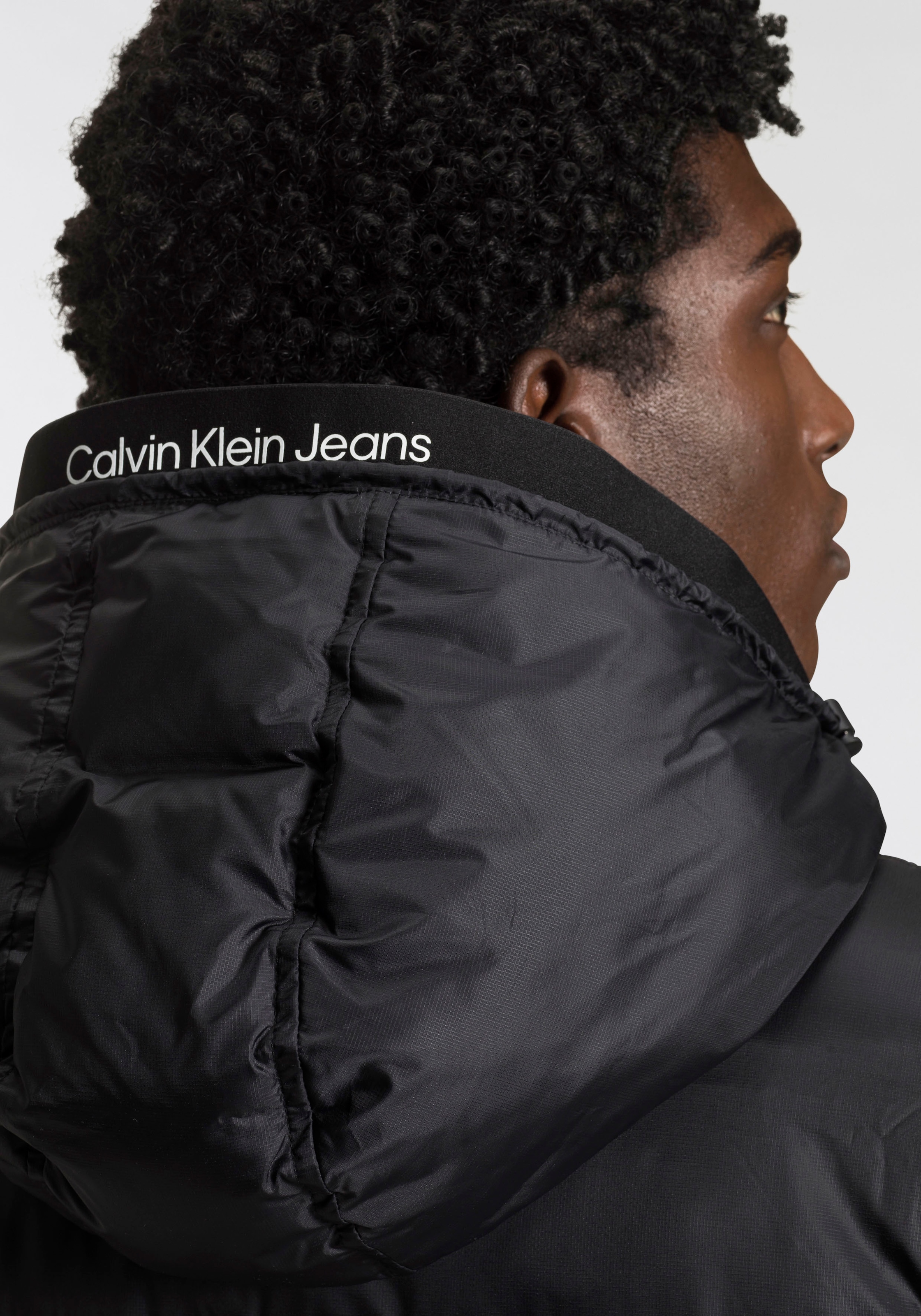Calvin Klein Jeans Steppjacke »LOGO TAPE LW PADDED JACKET«, mit Kapuze