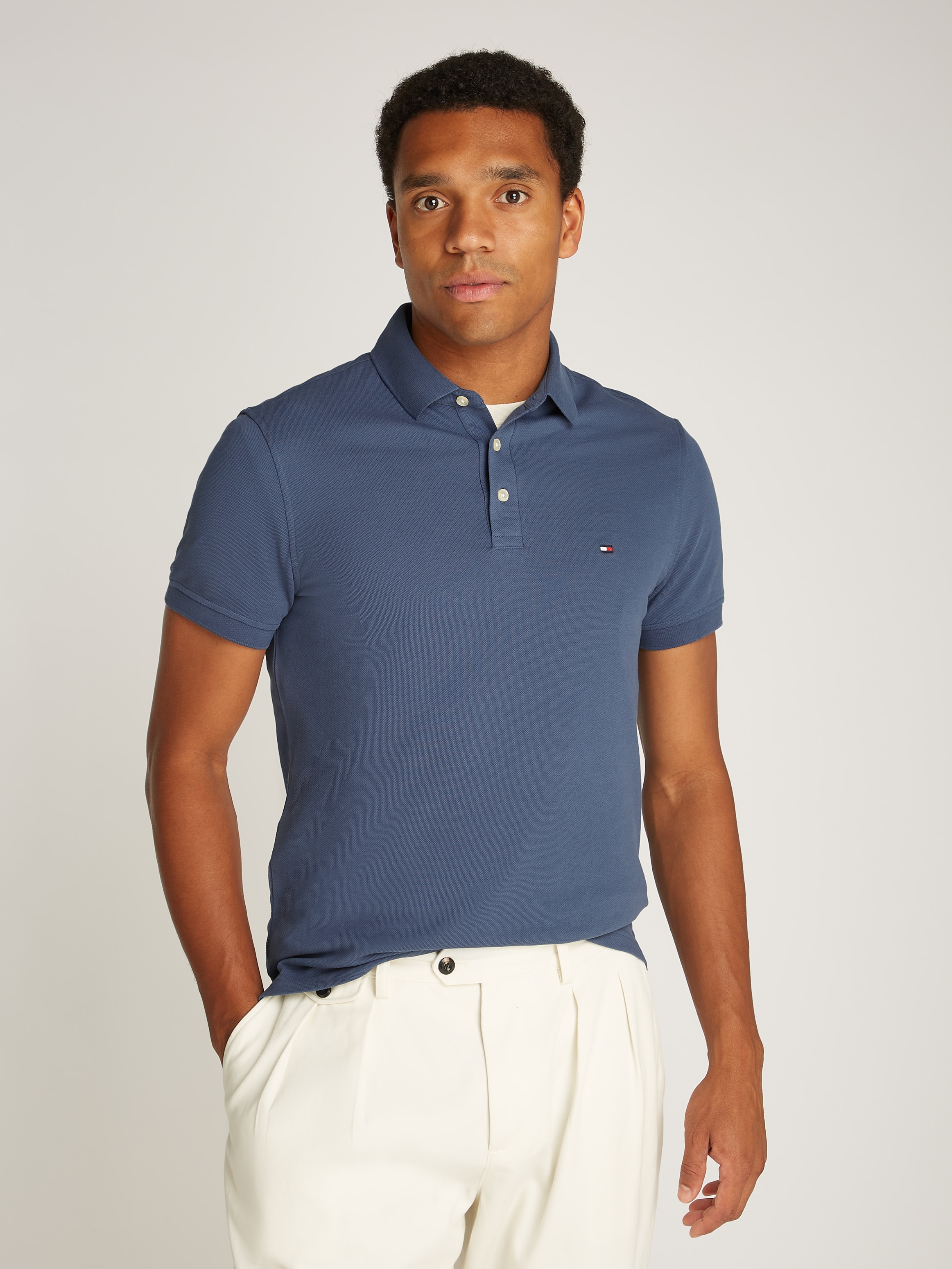 Tommy Hilfiger Poloshirt »1985 SLIM POLO«, aus leicht strukturiertem Piqué-Material