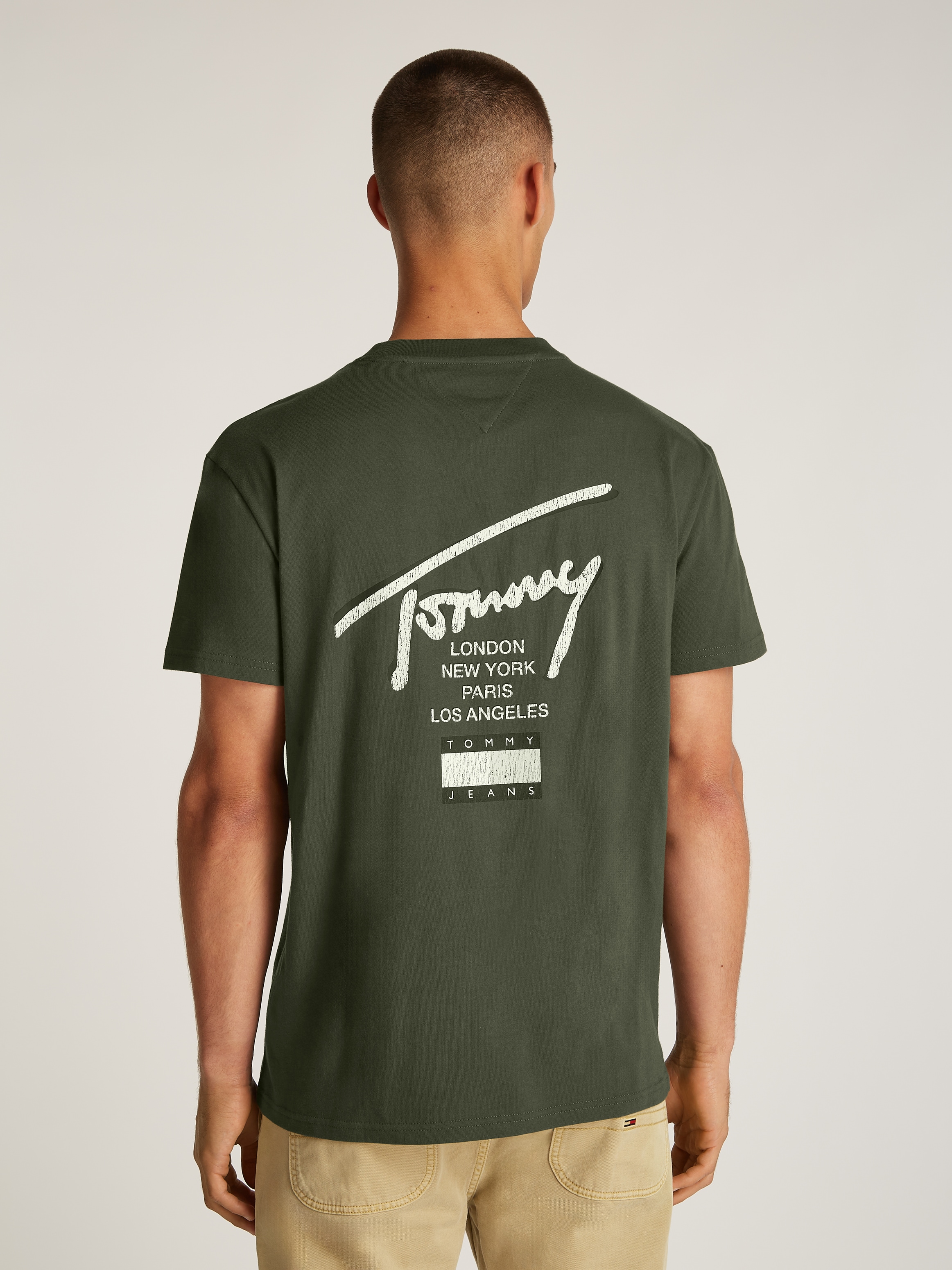 Tommy Jeans T-Shirt »TJM REG TOMMY SIGN CITY TEE EXT«, mit grossem Logo am Rücken