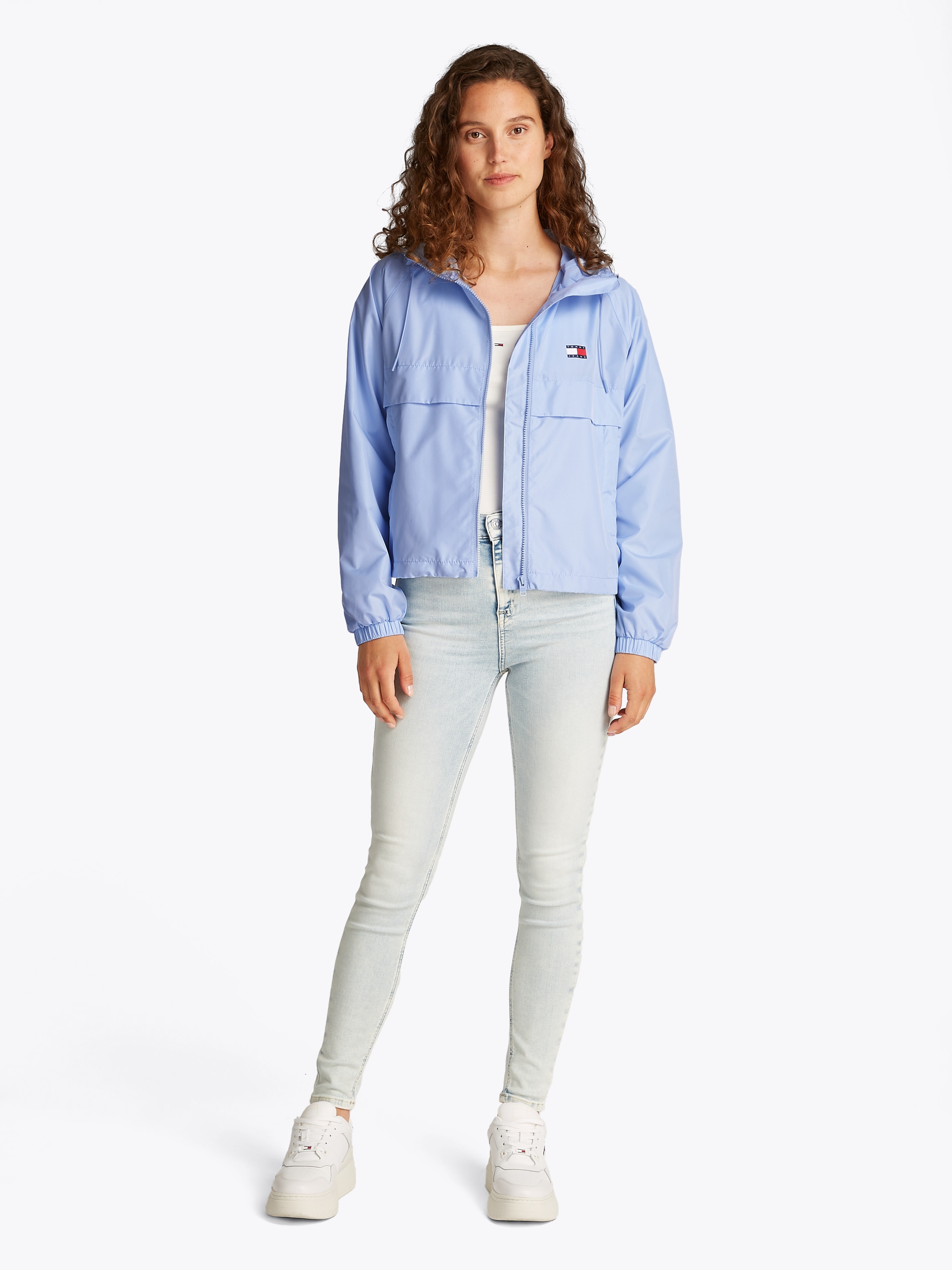 Tommy Jeans Windbreaker »TJW ESSENTIAL WINDBREAKER EXT«, mit Kapuze, mit Logodruck