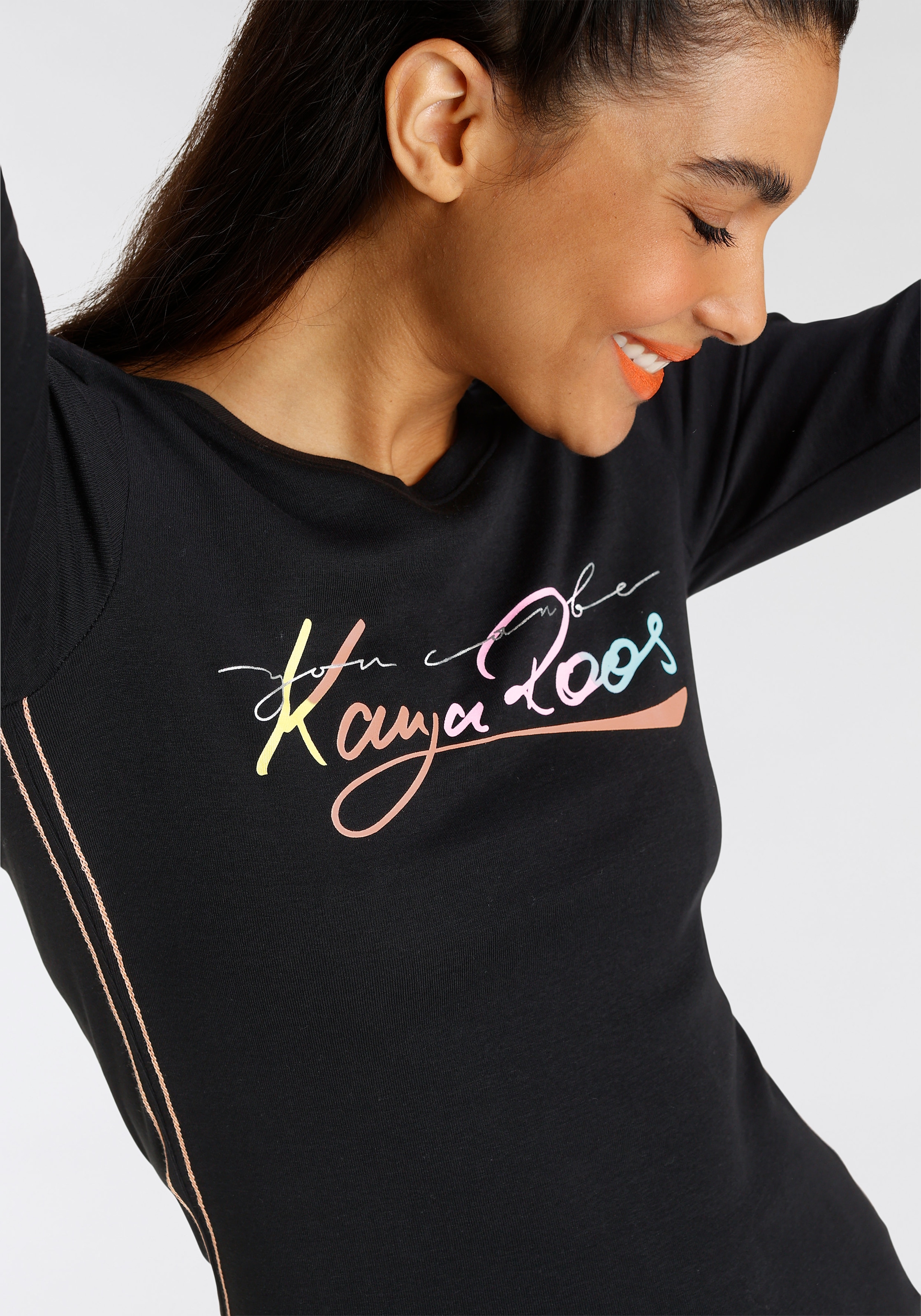 KangaROOS Langarmshirt, mit trendig farbigen - Jelmoli-Versand online Schweiz bei shoppen NEUE Logoschriftzug KOLLEKTION