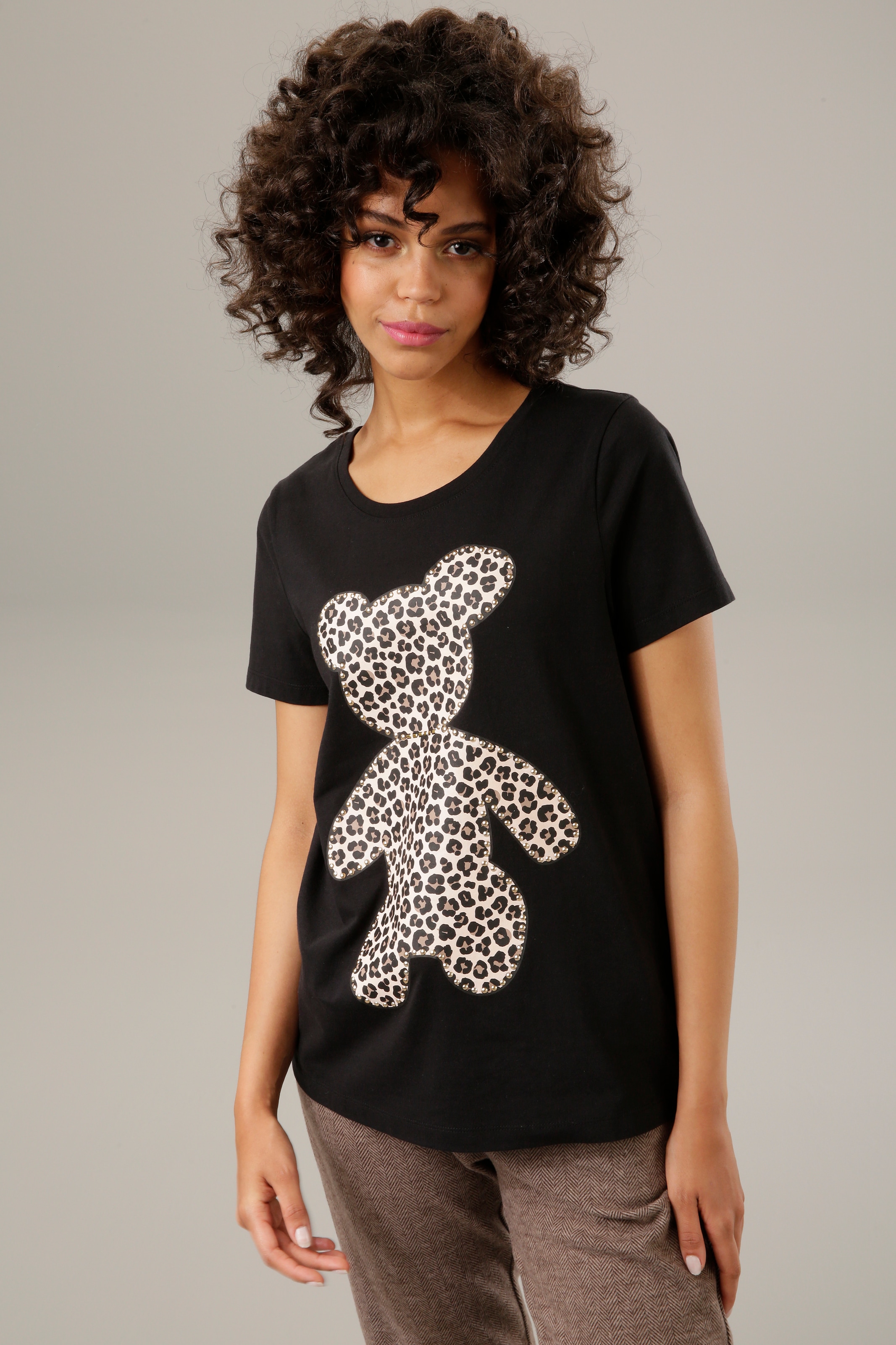 NEUE T-Shirt, CASUAL KOLLEKTIOM online Glanznieten Jelmoli-Versand - Aniston Bärchen-Frontdruck bestellen verzierter mit |