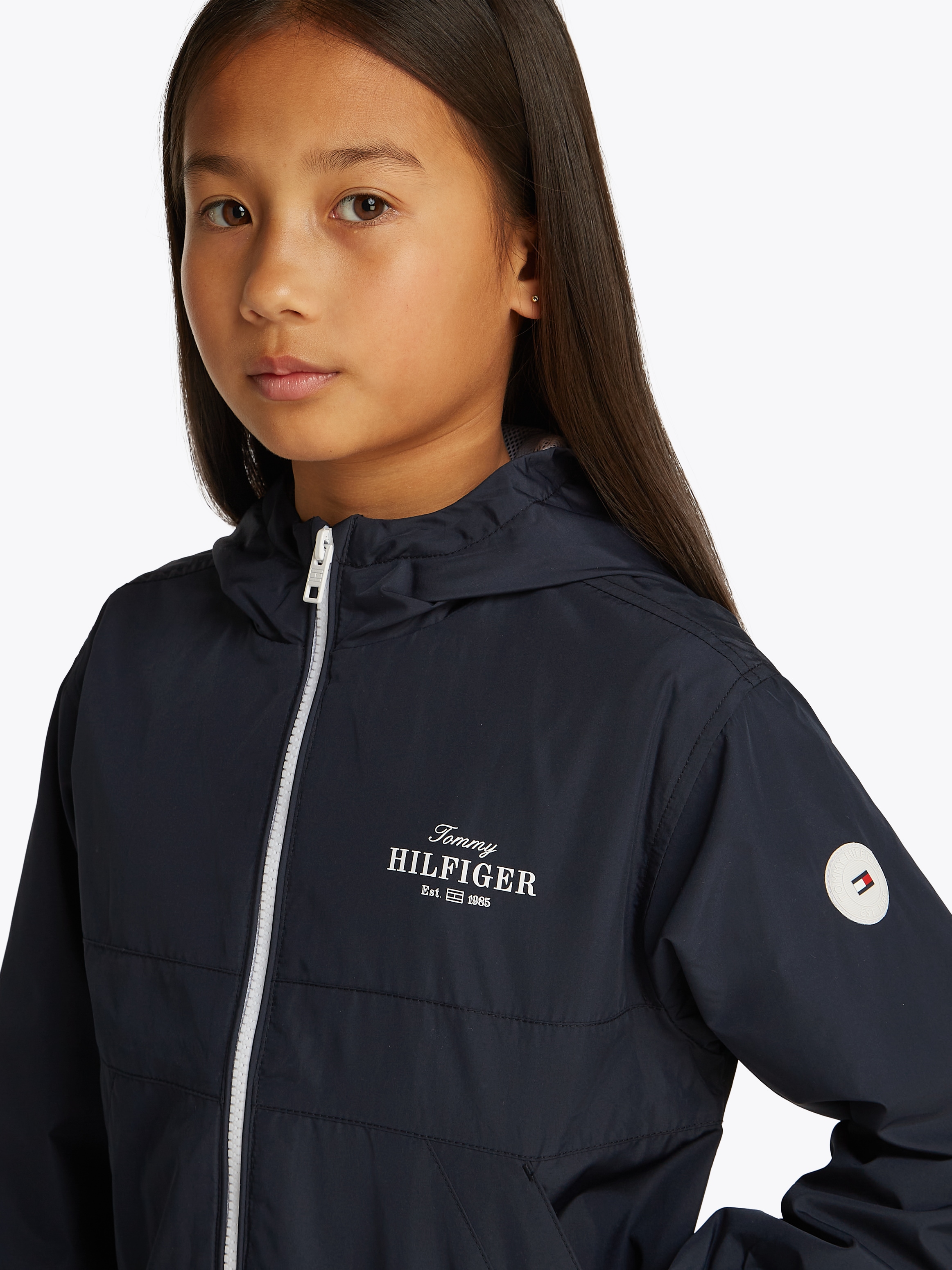 TOMMY HILFIGER Windbreaker »ESSENTIAL WINDBREAKER«, mit Kapuze, mit Logodruck