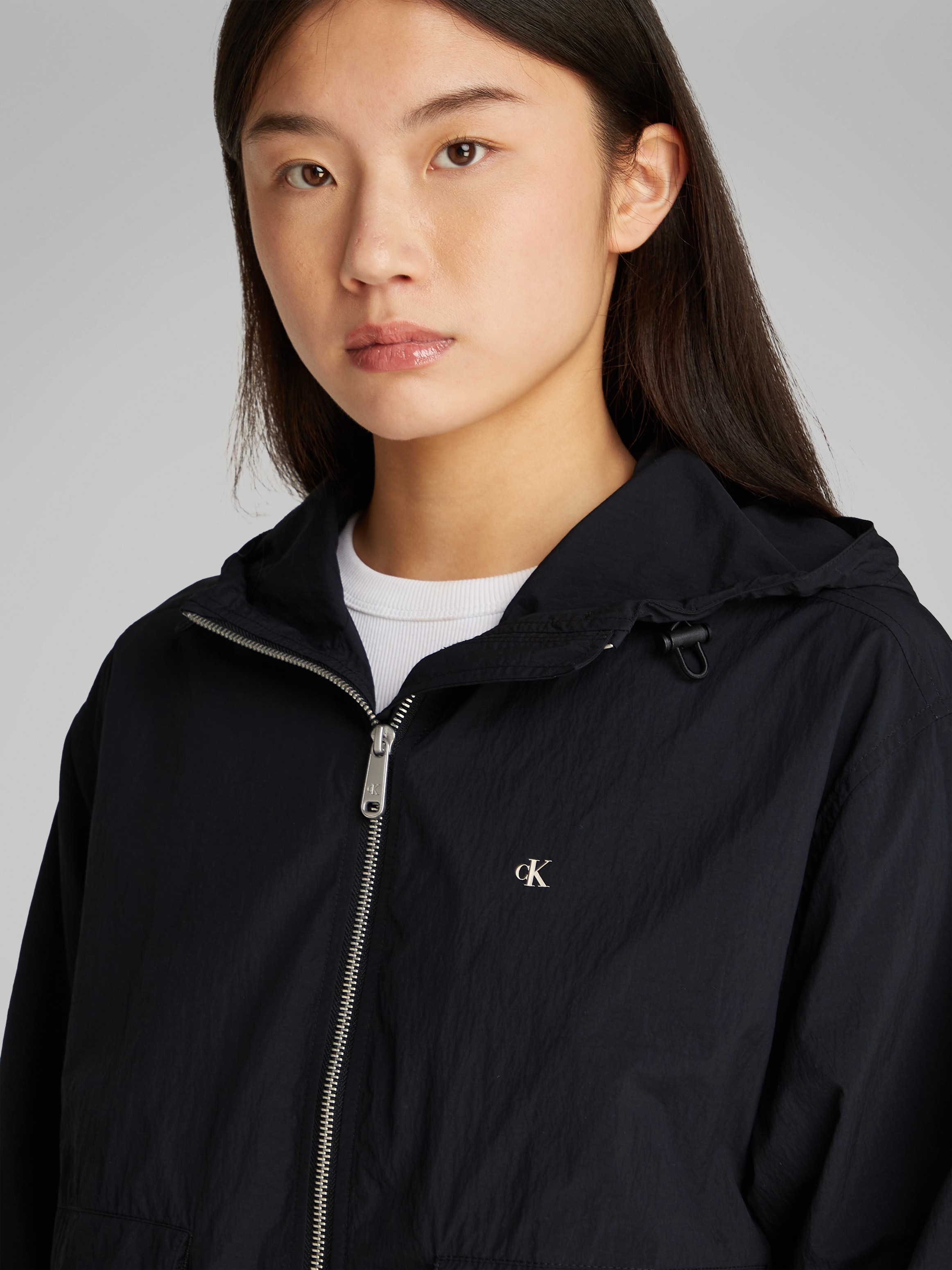 Calvin Klein Jeans Windbreaker »COTTON NYLON WINDBREAKER JACKET«, mit Kapuze, mit Logodruck