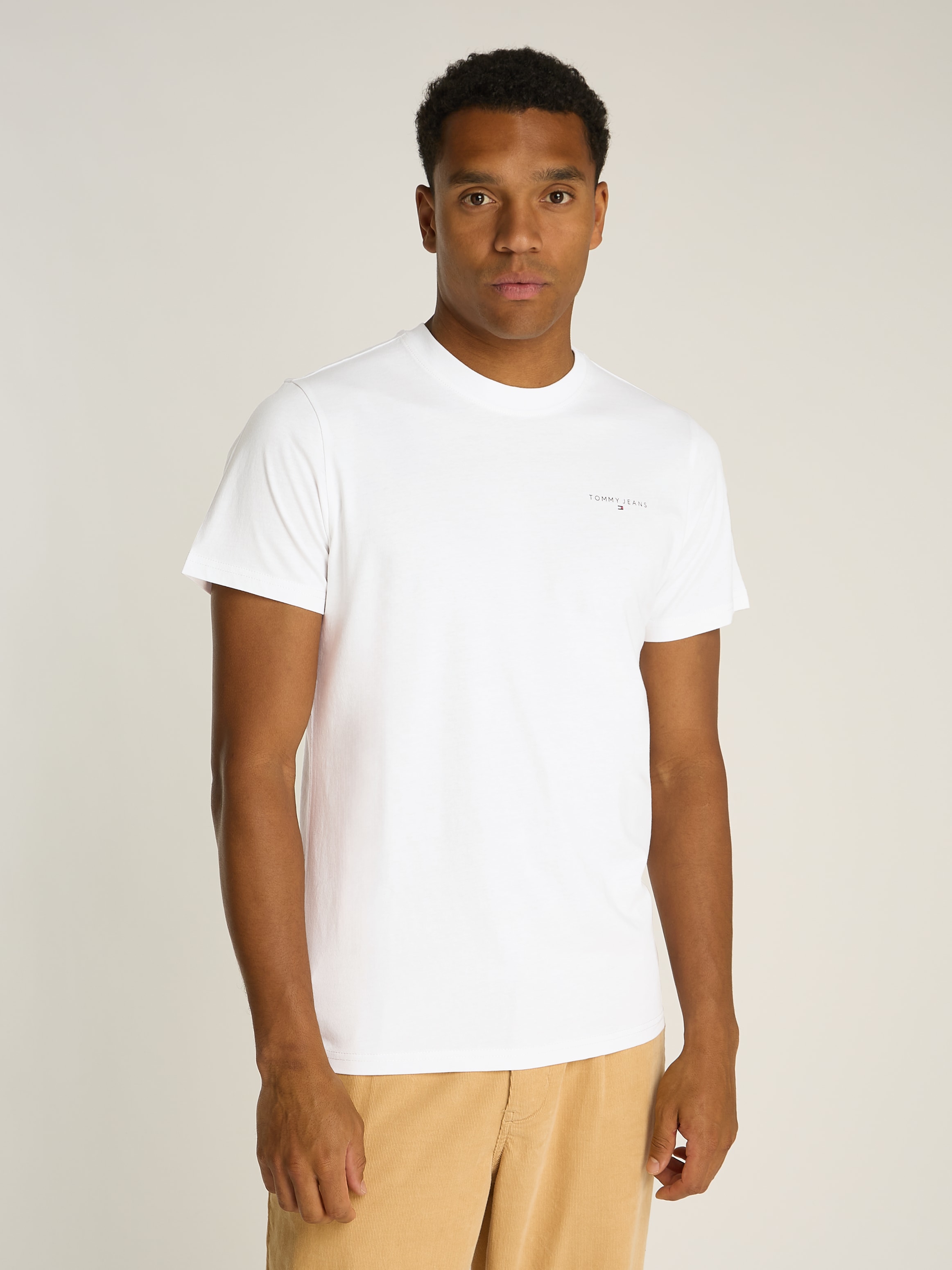 Tommy Jeans T-Shirt »TJM SLIM LINEAR CHEST TEE EXT«, mit Logoschriftzug