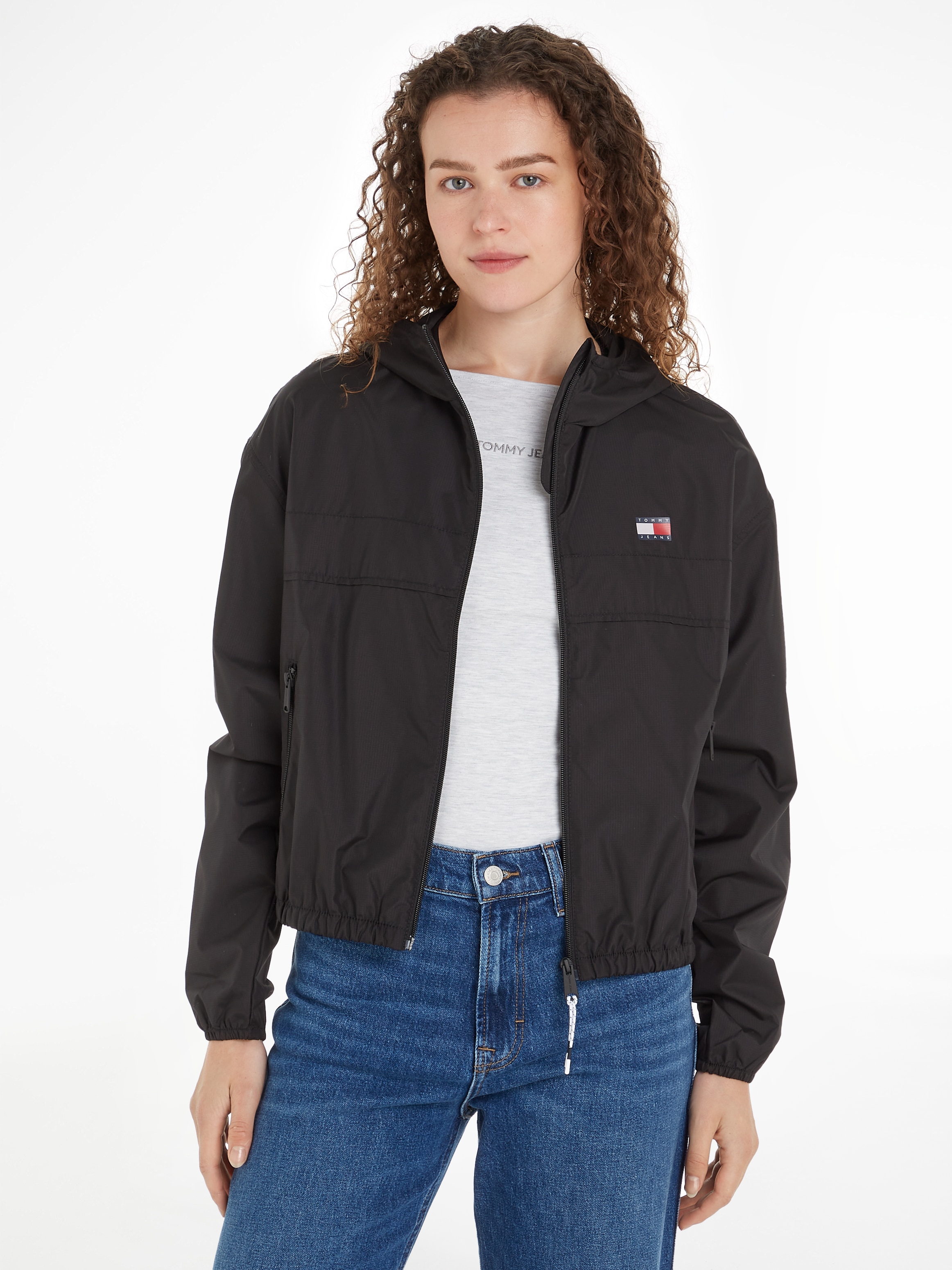 Tommy Jeans Windbreaker »TJW CRP LT CHICAGO«, in modischer Cropped Form