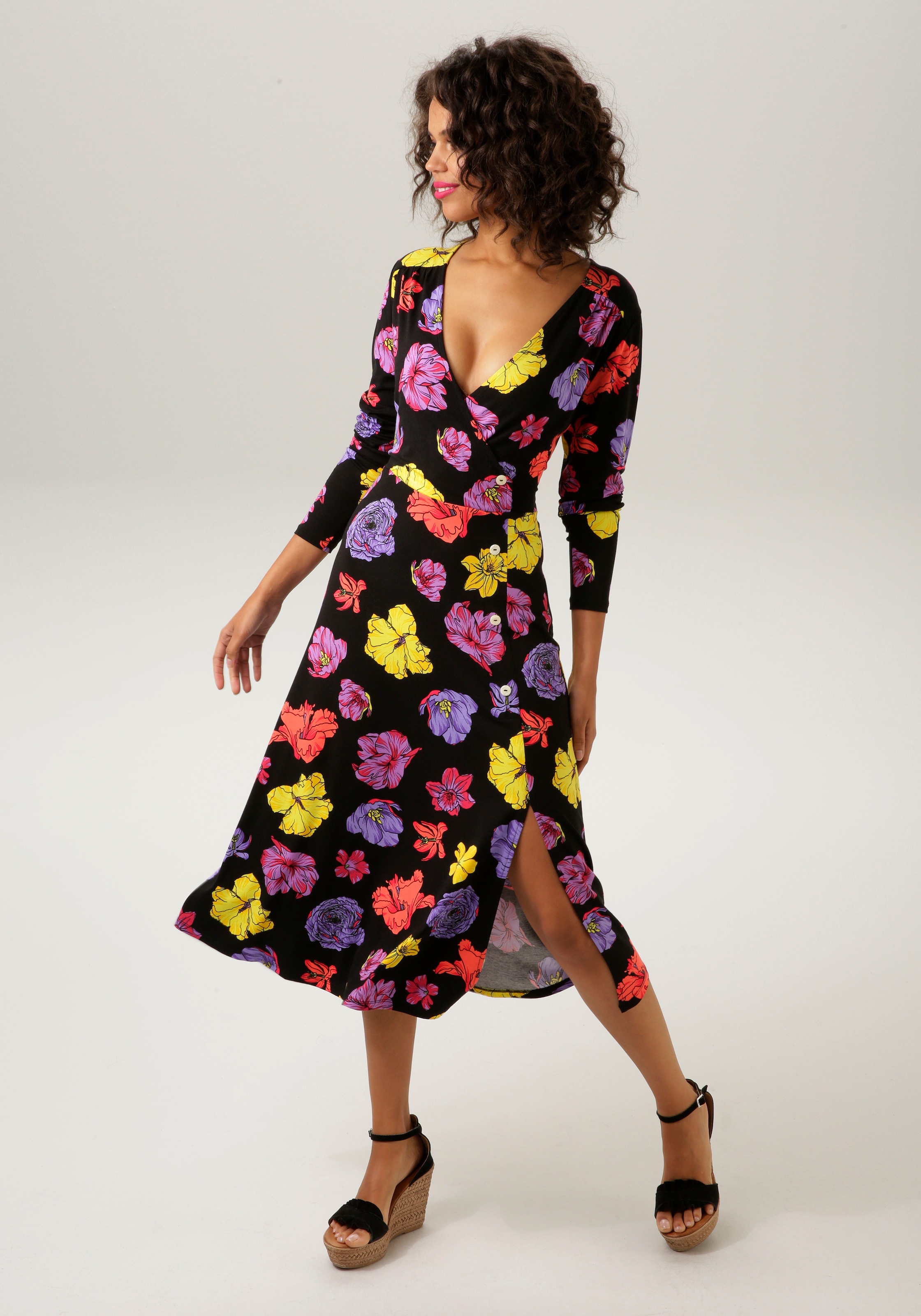 Aniston CASUAL Jerseykleid, mit farbenfrohen Blüten bedruckt