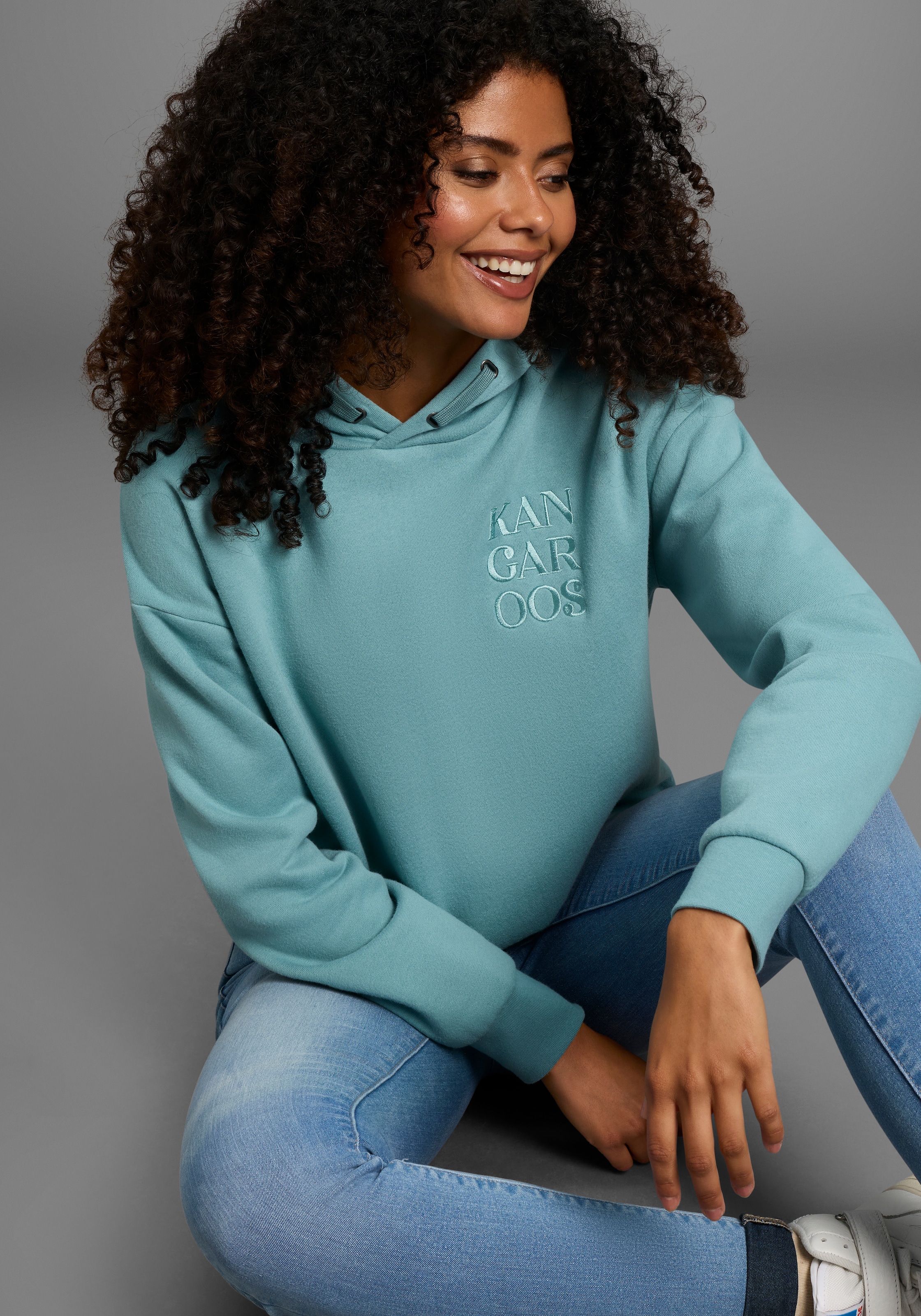 KangaROOS Kapuzensweatshirt, mit Druckknöpfen am Saum