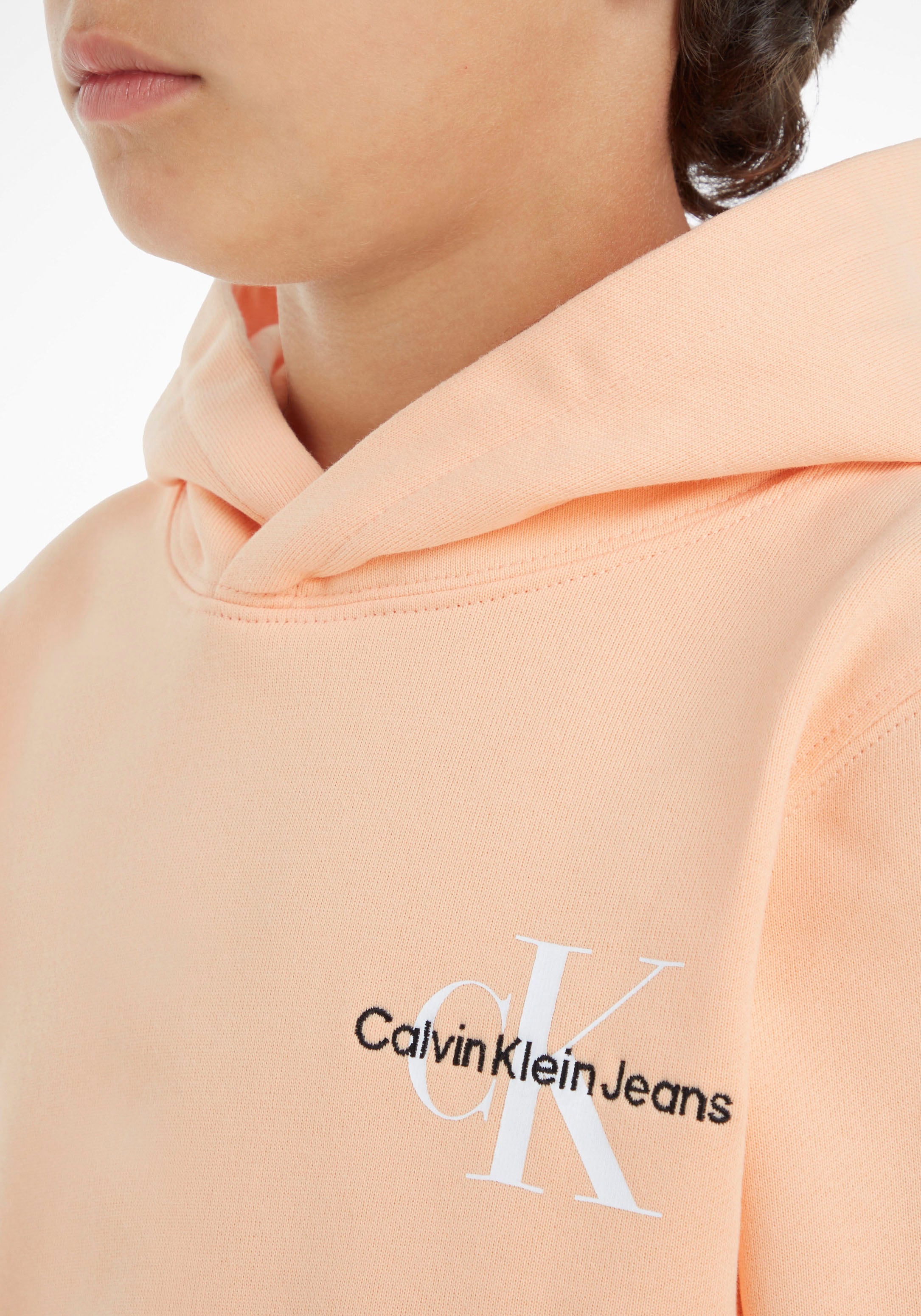 Logostickerei Jelmoli-Online Klein Kapuzensweatshirt, ❤ Calvin Calvin Junior Kinder Jeans Shop der MiniMe,mit im Klein Kids auf Brust entdecken