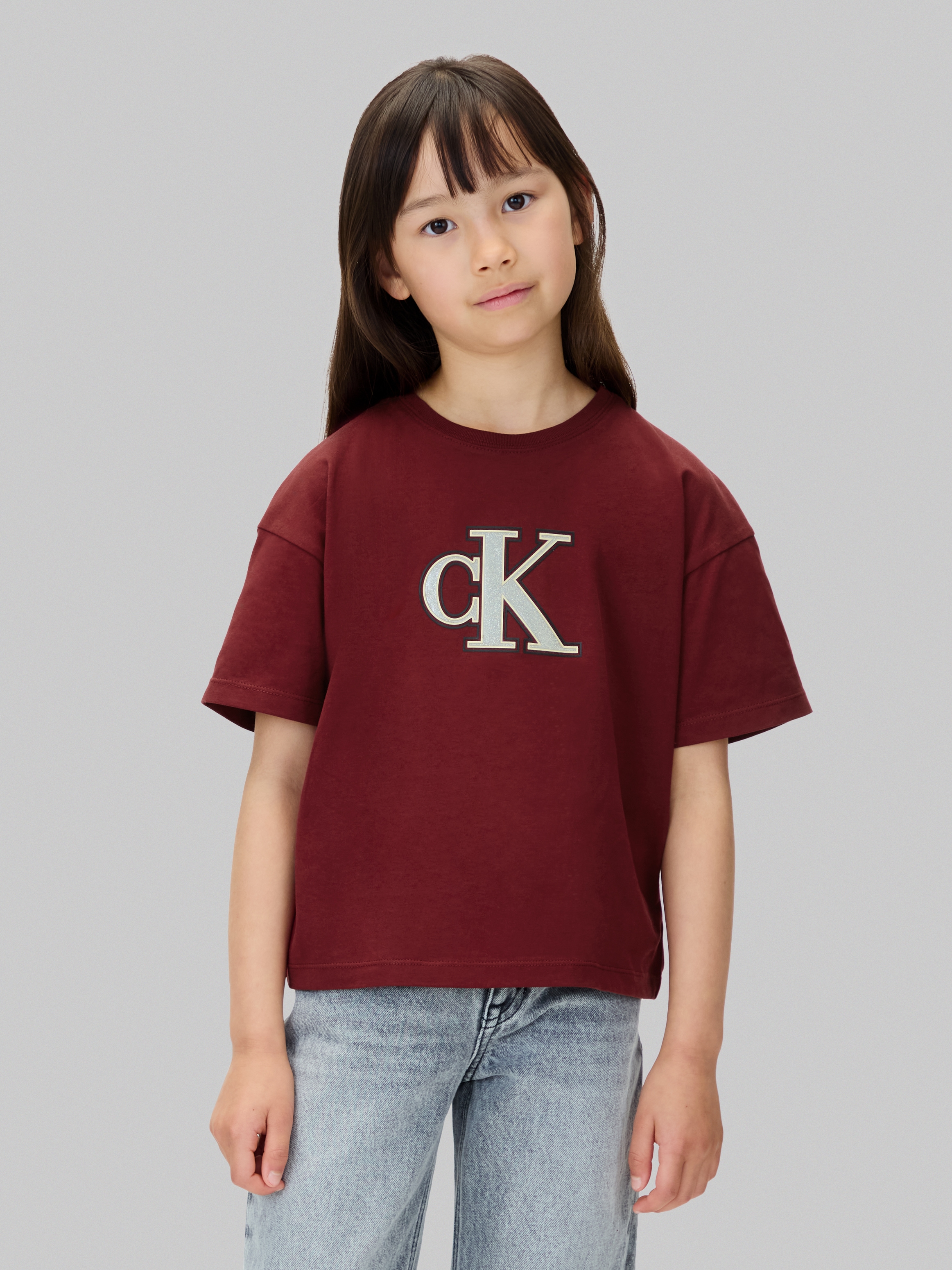 Calvin Klein Jeans T-Shirt »FESTIVE GRAPHIC SS T-SHIRT« für Kinder bis 16 Jahre, Glitzer-Druck