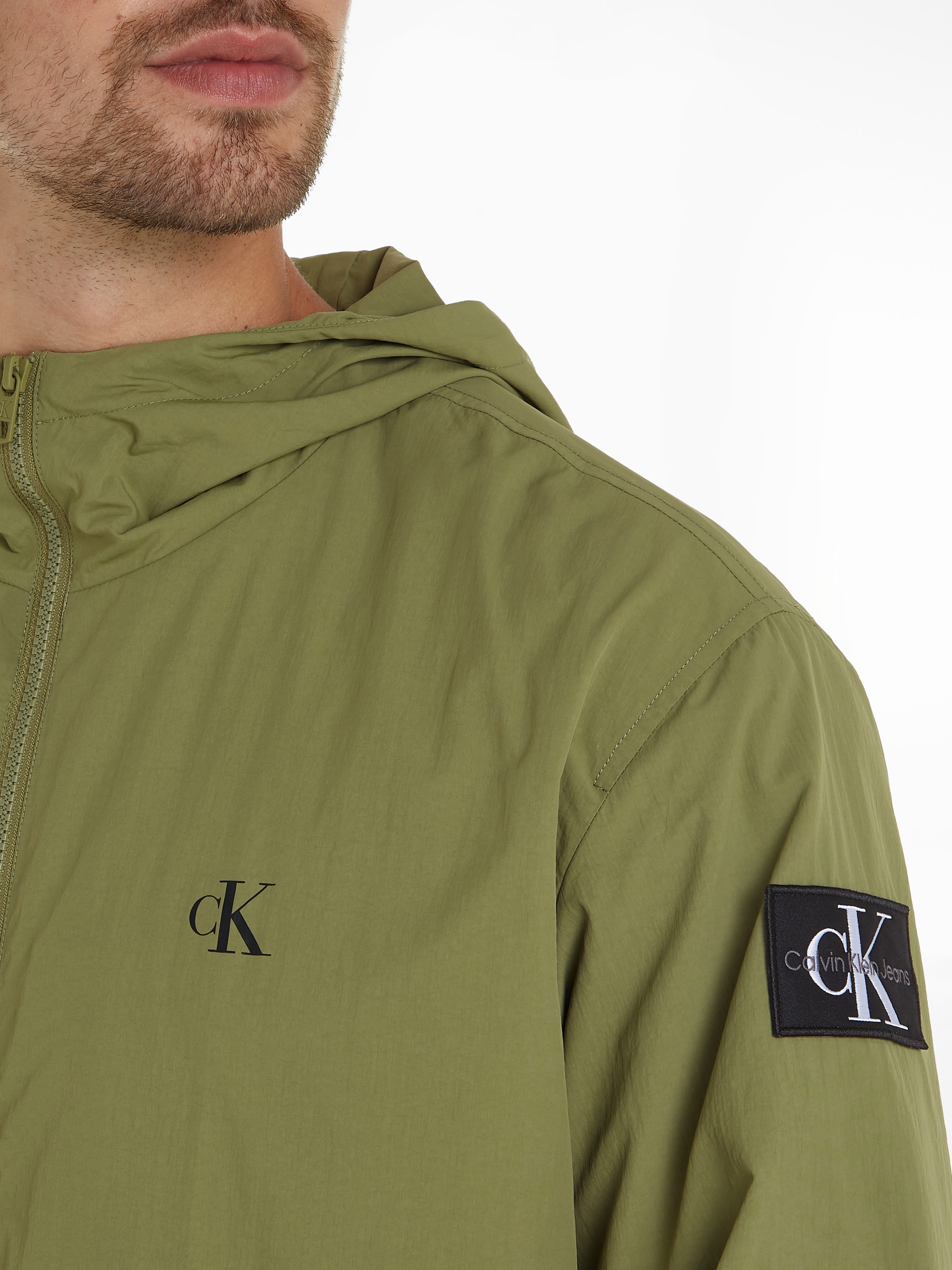 Calvin Klein Jeans Windbreaker »WINDBREAKER«, mit Kapuze, mit Calvin Klein Logo-Badge