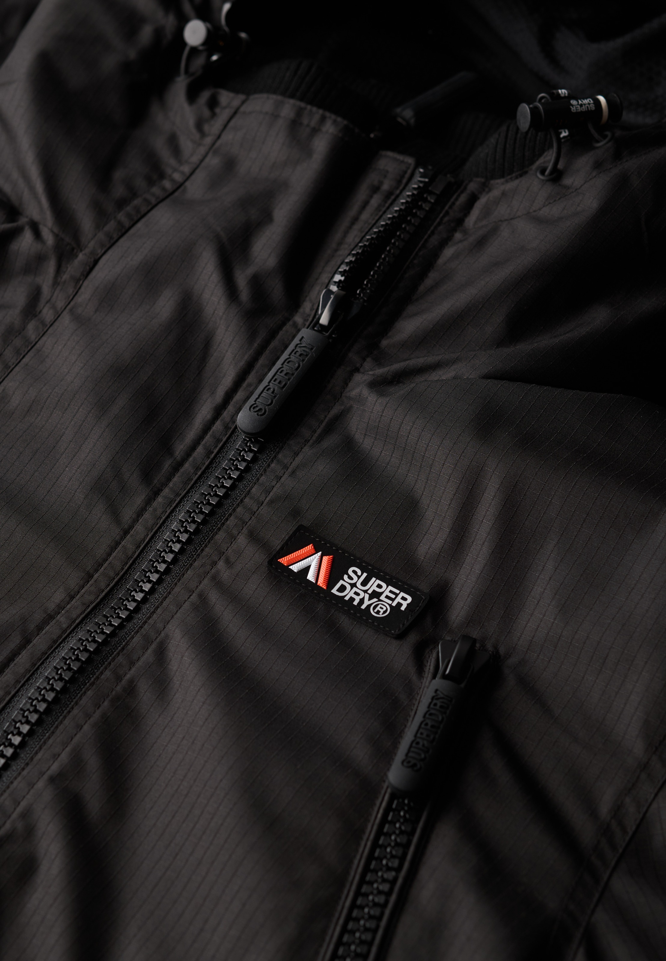 Superdry Outdoorjacke »HOODED MTN WINDBREAKER JACKET«, mit Kapuze