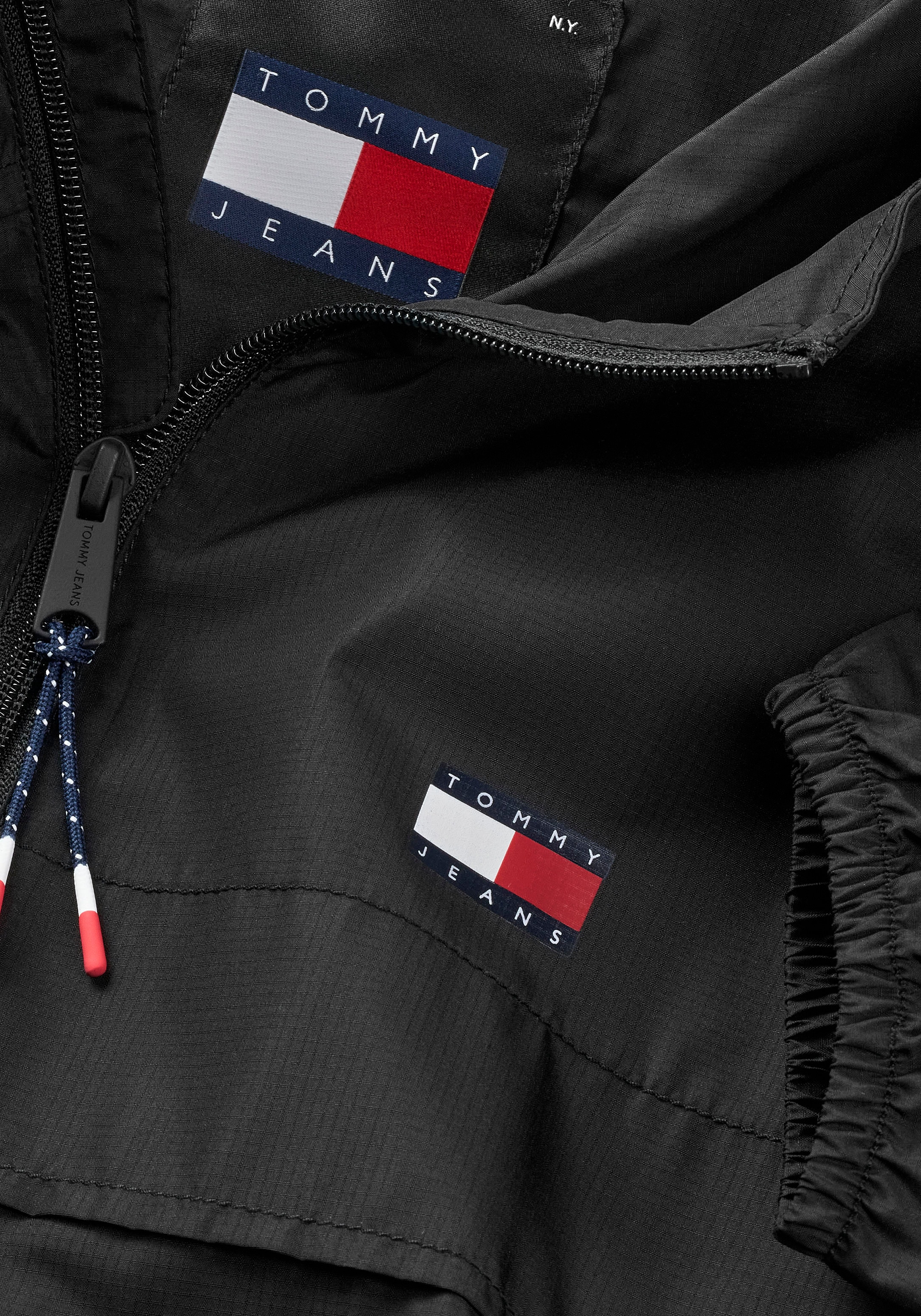 Tommy Jeans Outdoorjacke »TJM LW CHICAGO JACKET«, mit Kapuze, mit Logoprägung