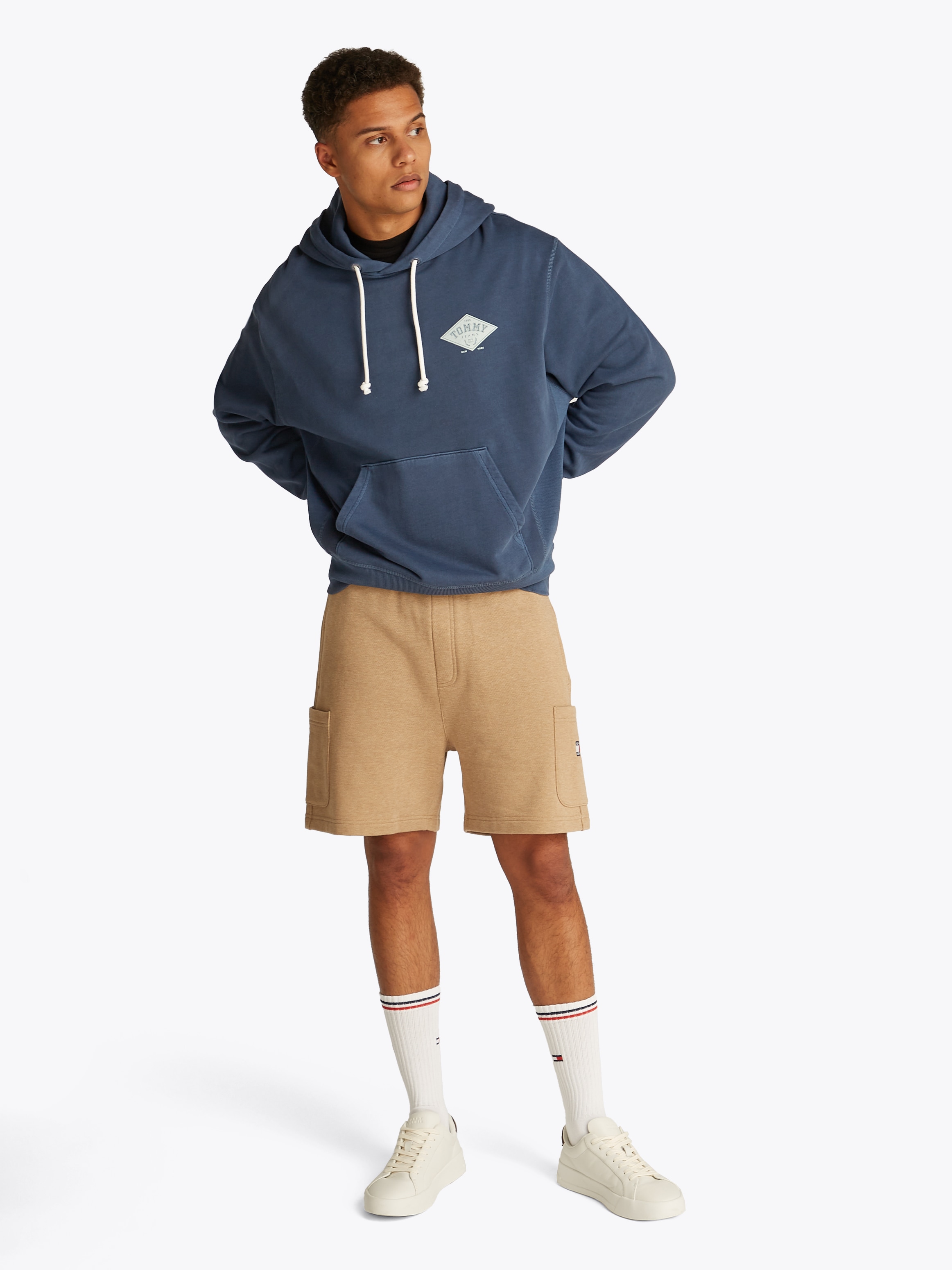 Tommy Jeans Kapuzensweatshirt »TJM RLX VARSITY GRAPHICS HOODIE«, mit grossem Rückenprint